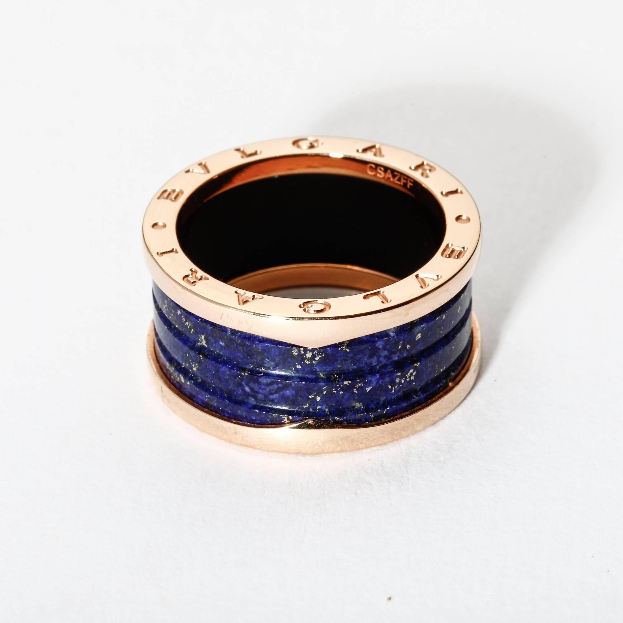 Inspired by the Colosseum in Rome, this 18k rose gold and lapis lazuli Bulgari B.zero1 ring represents both the eternal city and modern Italian design. The ring is in new condition and would make a perfect gift. Please note that it is a Bulgari size