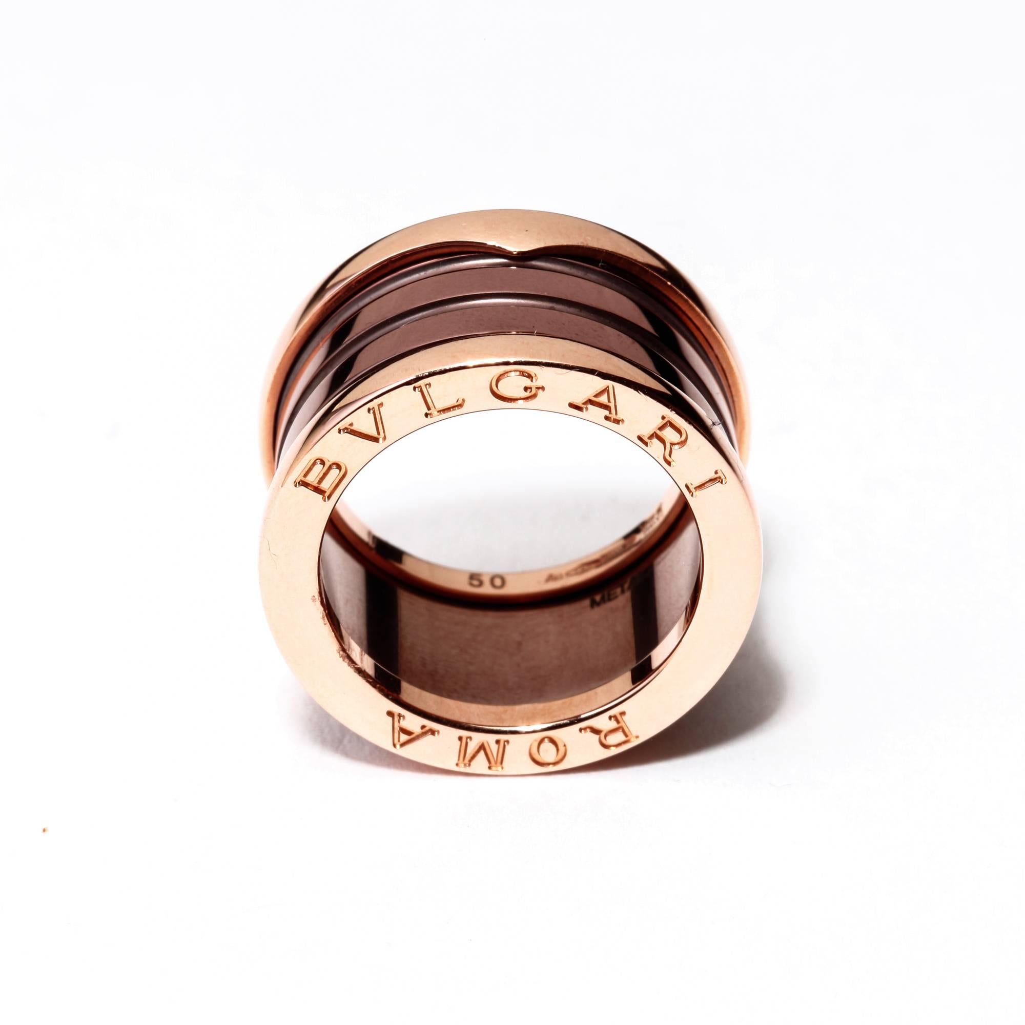 Inspired by the Colosseum in Rome, this 18k rose gold and bronze ceramic Bulgari B.zero1 ladies' special edition ROMA ring represents both the eternal city and modern Italian design. The ring is in new condition and would make a perfect gift. Please
