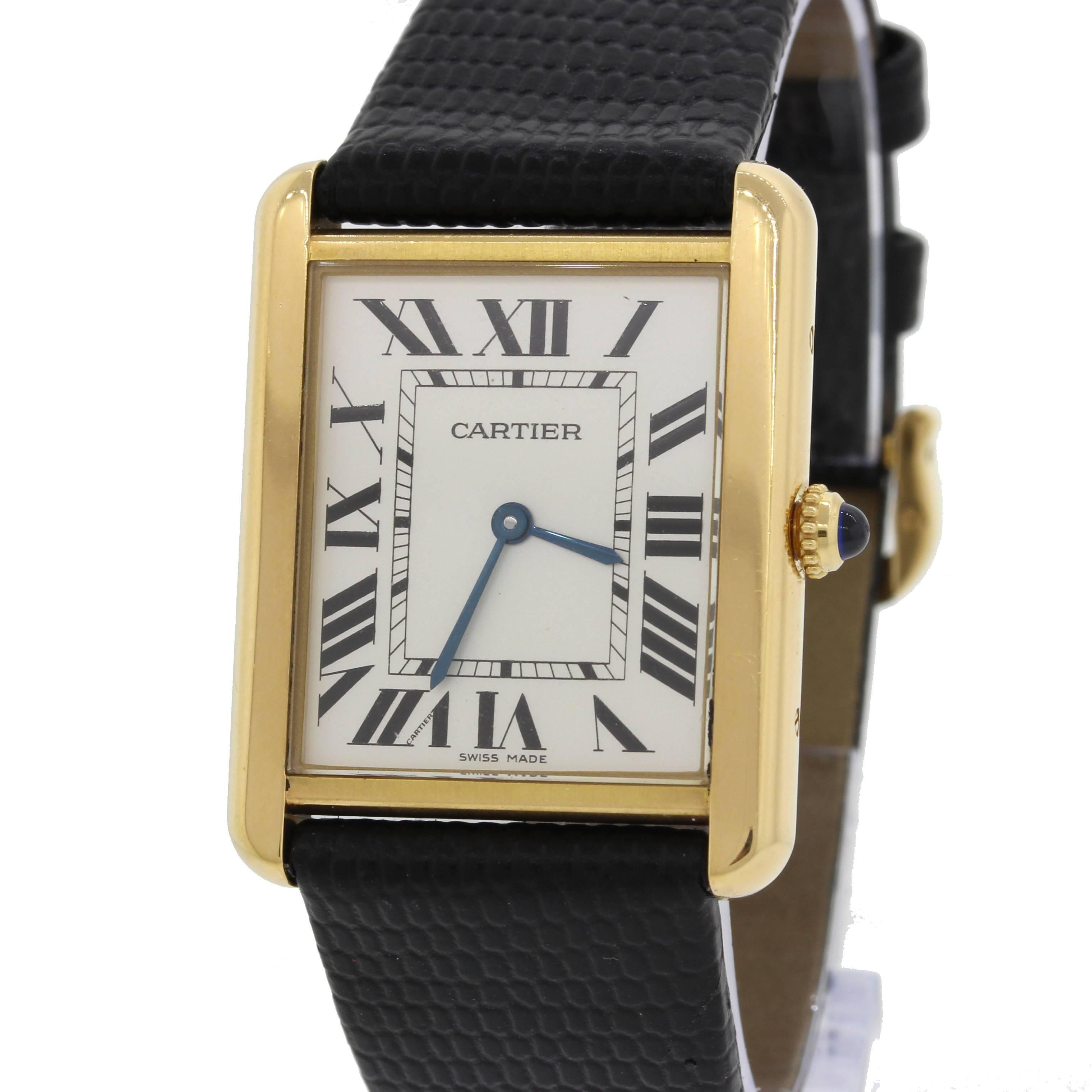 Cartier Tank Solo 18k Yellow and White Gold Roman Black Leather Watch.

Brand       Cartier (Guaranteed Authentic)
Model 	Tank Solo

Reference Number   2742
Serial Number 	751276**

Gender 	Unisex
Metal 	18k Yellow Gold

Case Size 	26mm X