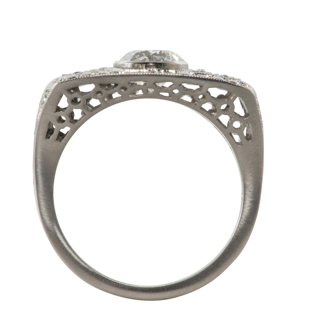 Modern Sapphire Diamond Platinum Ring For Sale
