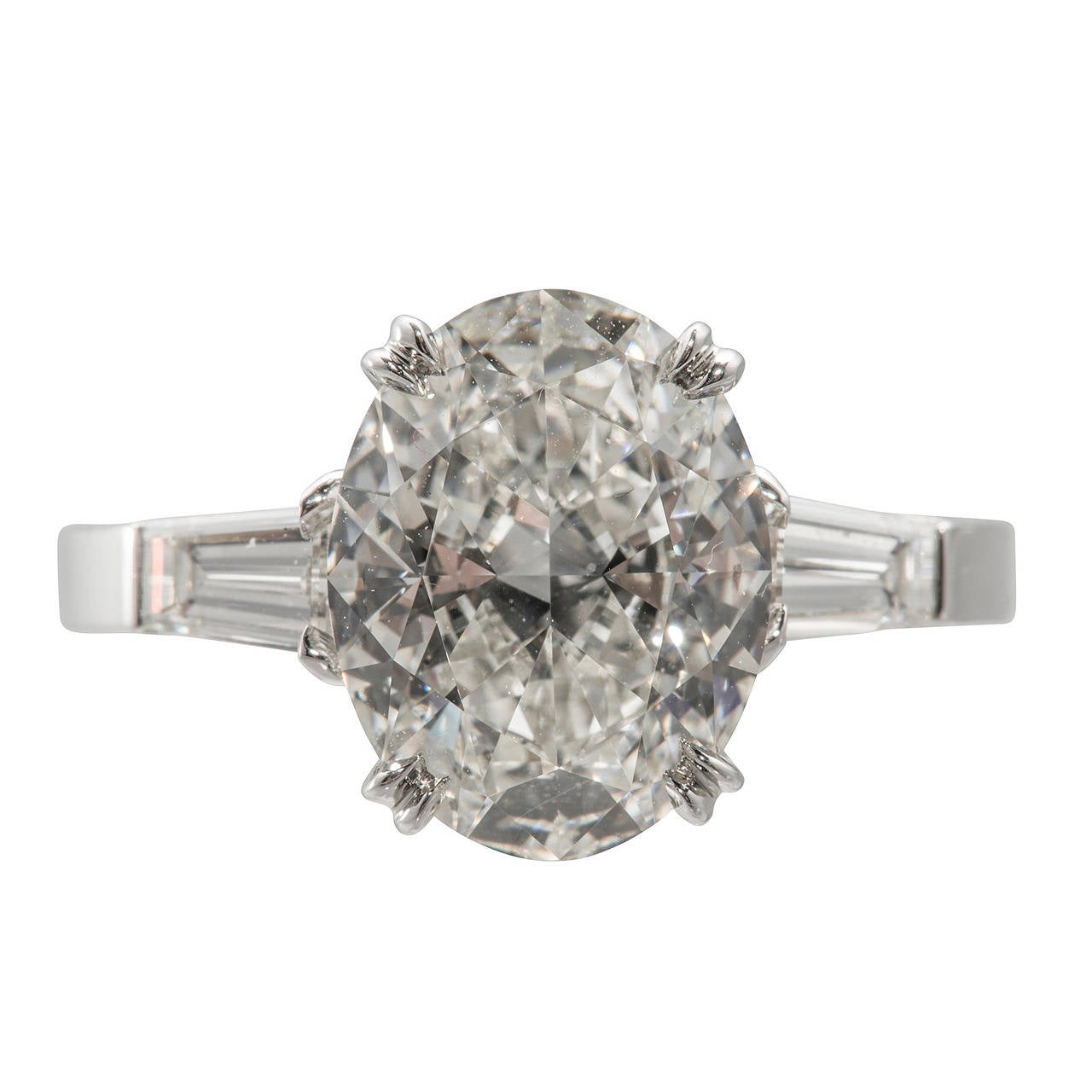 Oval diamond engagement rings with baguettes