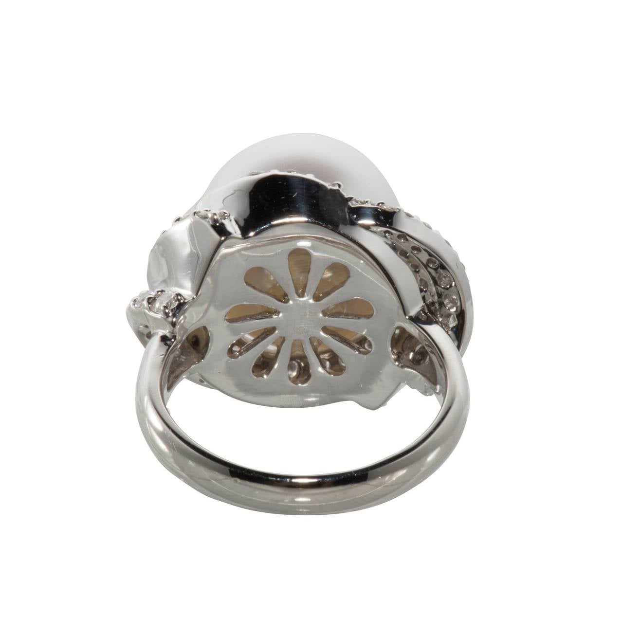 Elegant South Sea pearl and diamond cocktail ring. The pearl is 13.3mm and the diamond weight is 1ct.  It is a size 6.5 but can be easily resized.