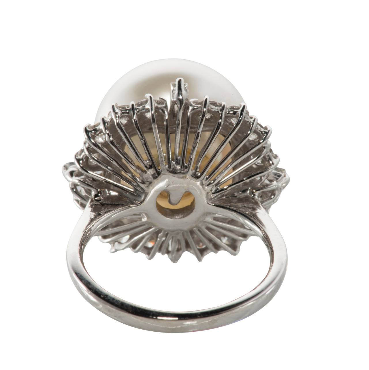 Elegant South Sea pearl and diamond cocktail ring. The pearl is 14mm and the ring size is 5 1/2.  This ring can easily be resized.