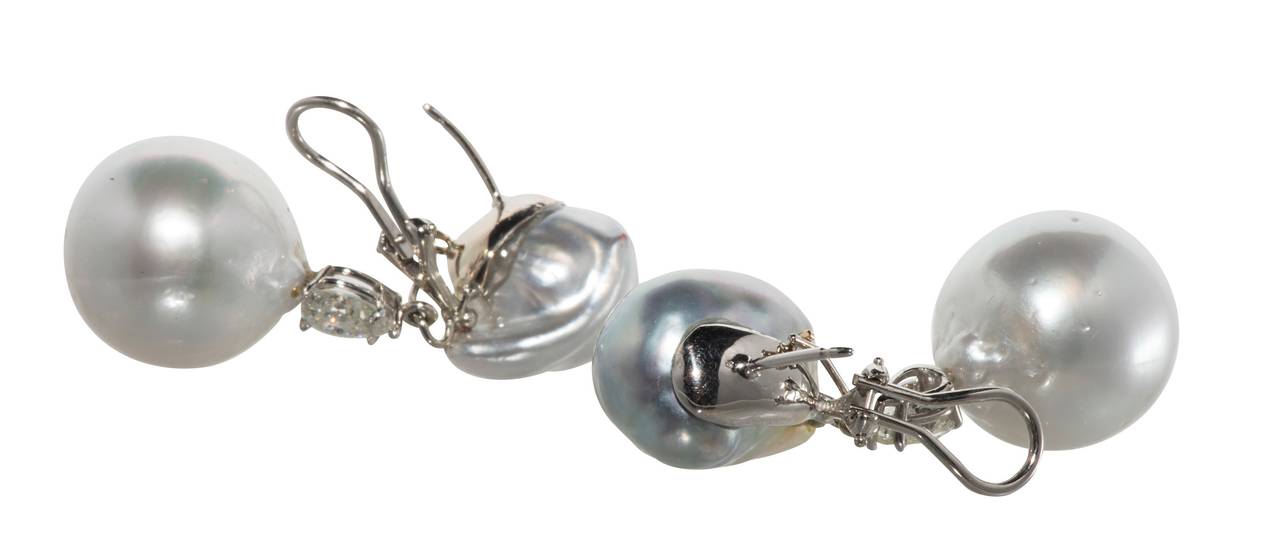 Lovely Baroque South Sea and Diamond drop Earrings. The pearl tops are14mm, the drops are 17.25mm and the 2 diamonds =1.00 ct. tw.