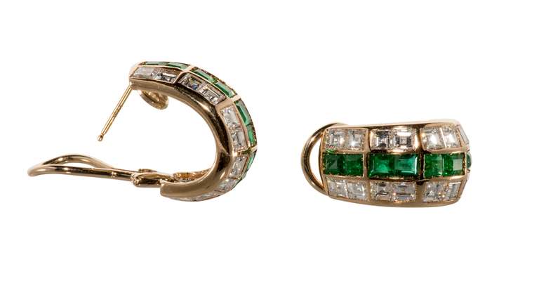 18kt yellow gold, emerald and diamond earrings. Square cut emeralds and diamonds channel set. With serial number, unsigned.