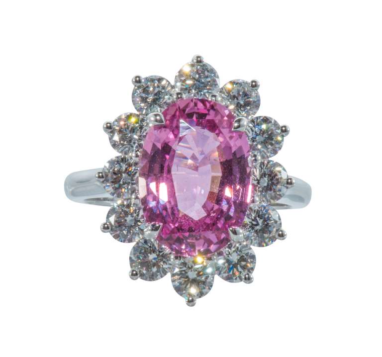 Padparadscha Pink Sapphire (5.29c) and Diamond (1.91c) Platinum ring.