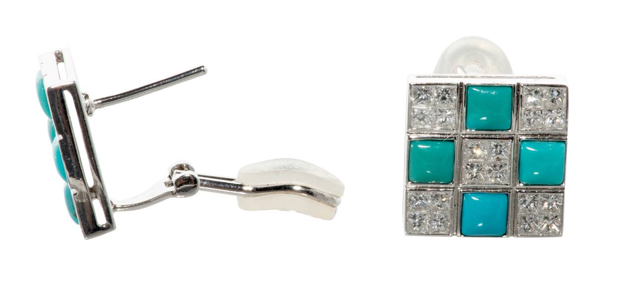 These are dazzling turquoise and radiant cut diamond earrings  They are made in a checkerboard motif set in white gold.