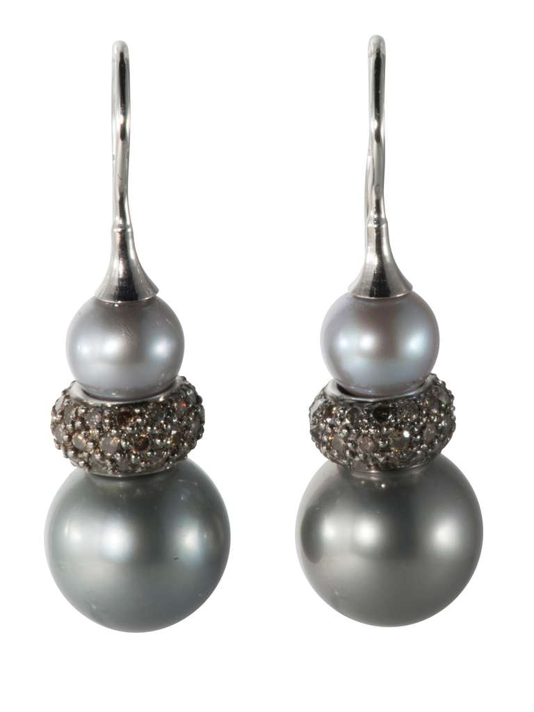 Elegant Tahitian Pearl drop earrings with brown diamonds.