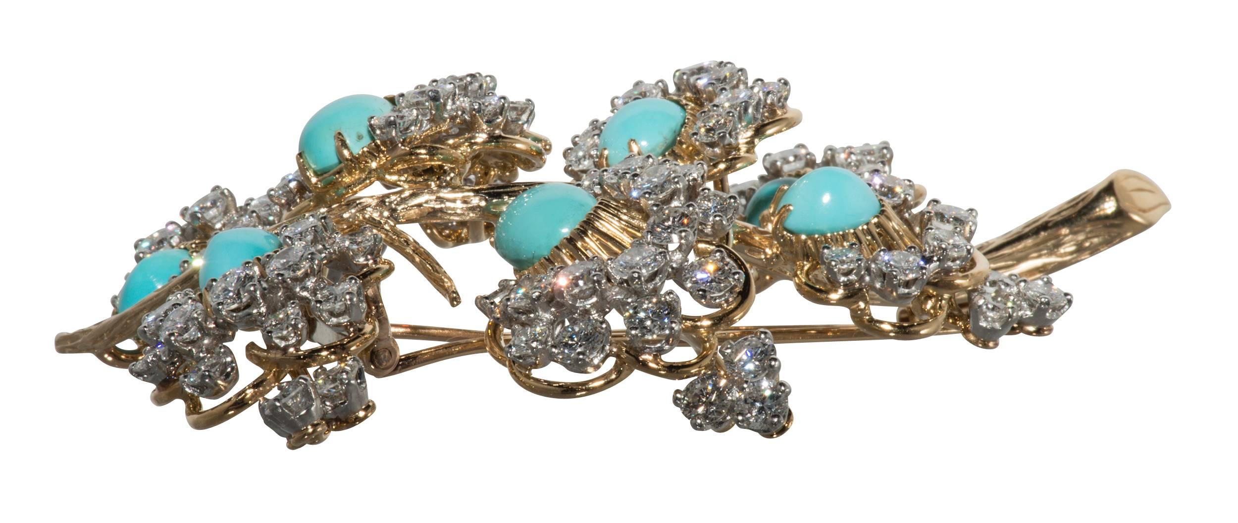 This is a beautiful diamond and turquoise branch design brooch.  It has a French hallmark.  