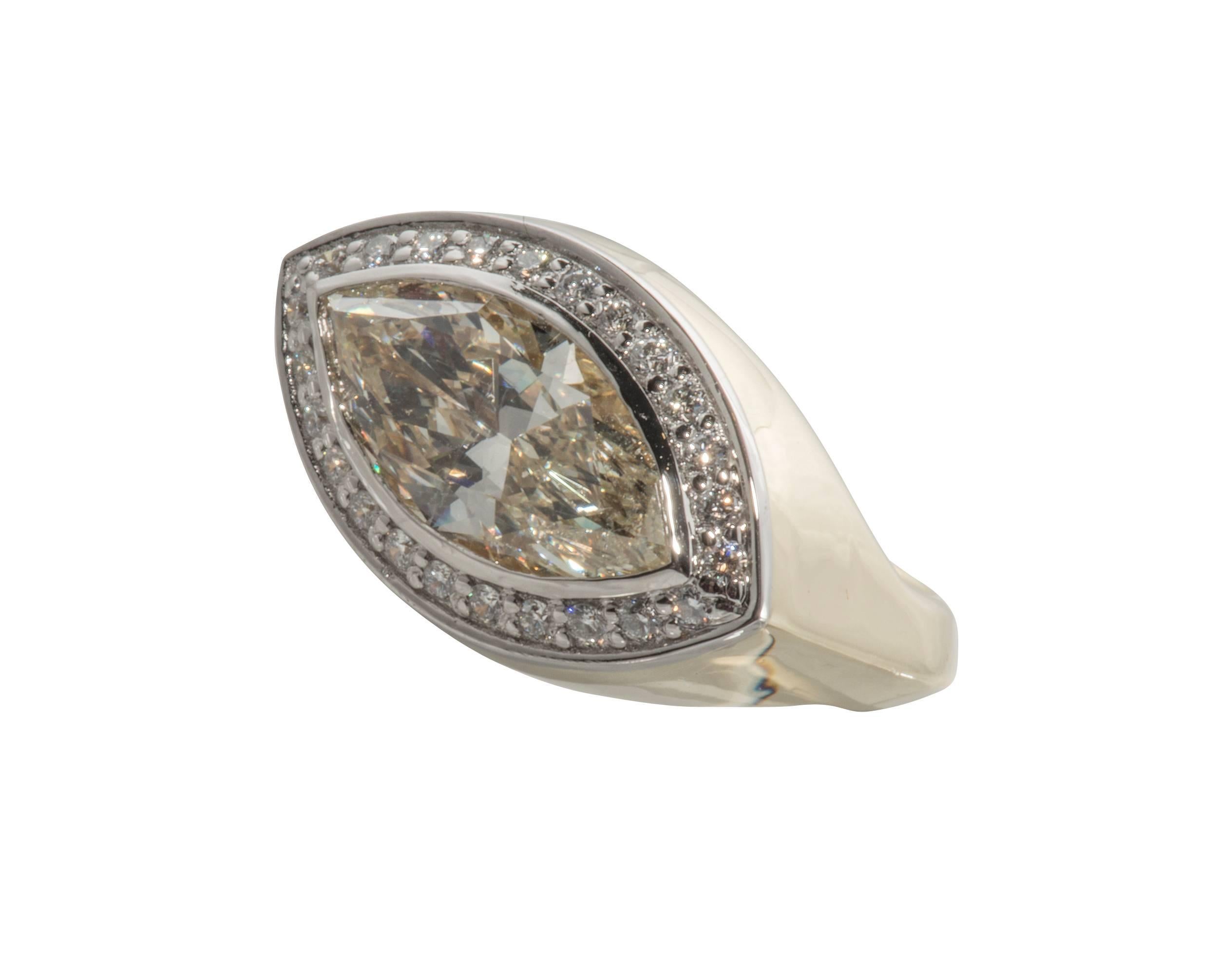 This is a beautiful yellow marquis diamond cocktail ring set in 18k yellow gold and platinum.  It is a size 6 1/2 but can easily be resized.