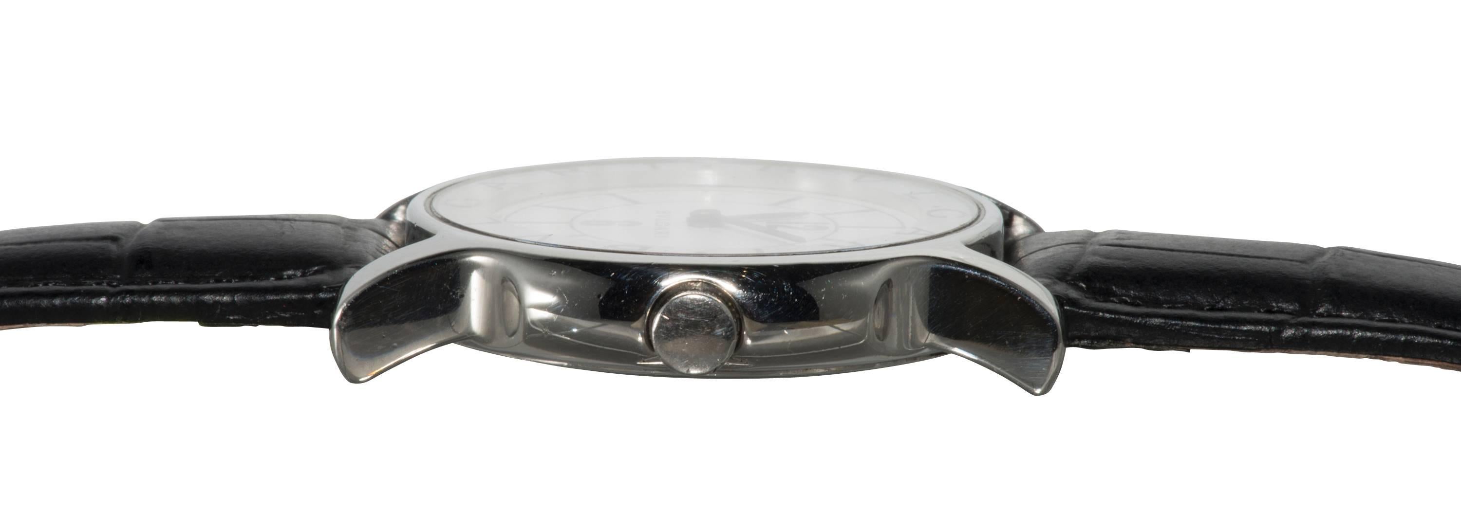 This is a unisex stainless Bulgari watch.
