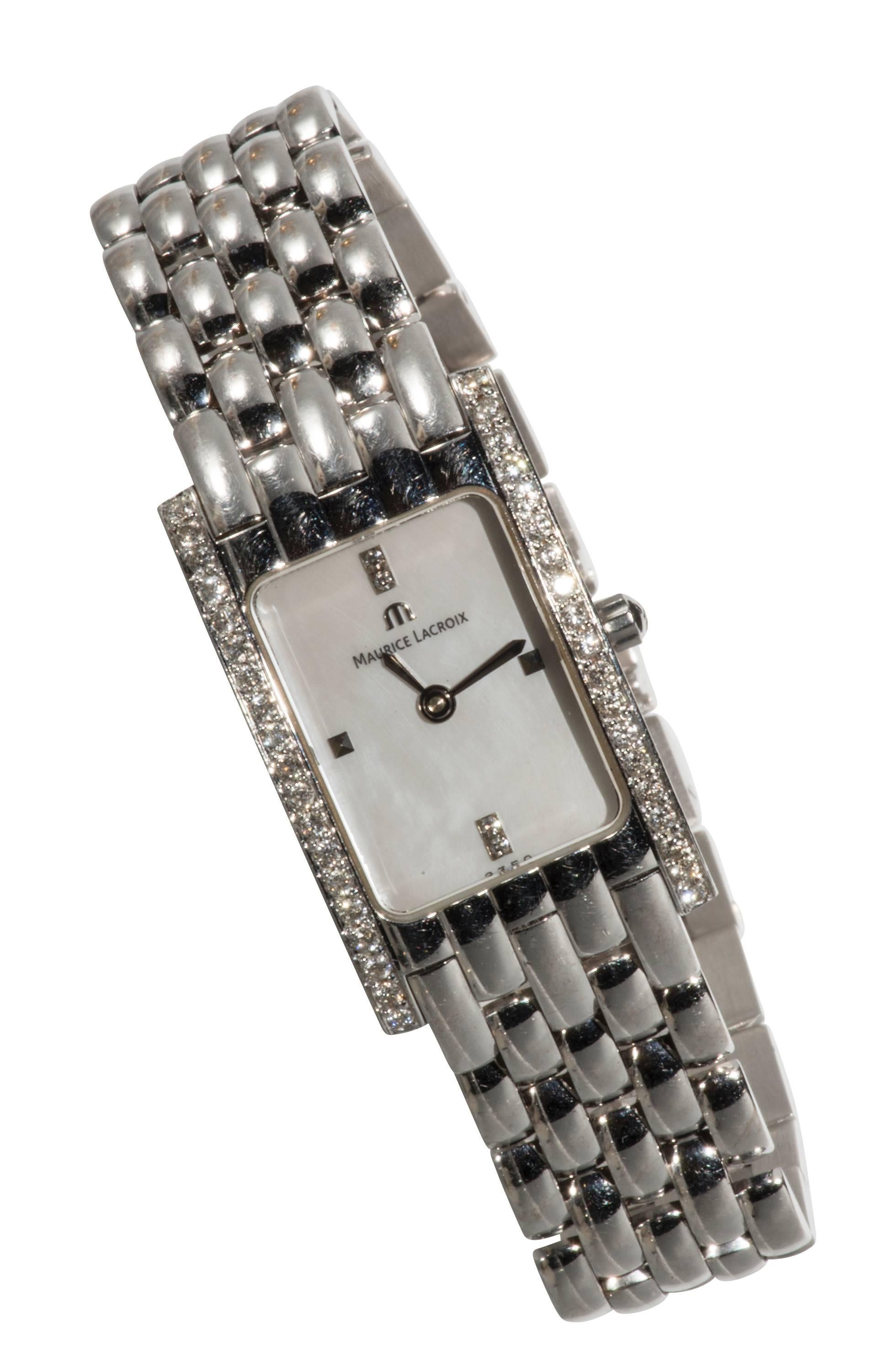 This is a beautiful 18k. white gold ladies watch with diamonds and a quartz movement.