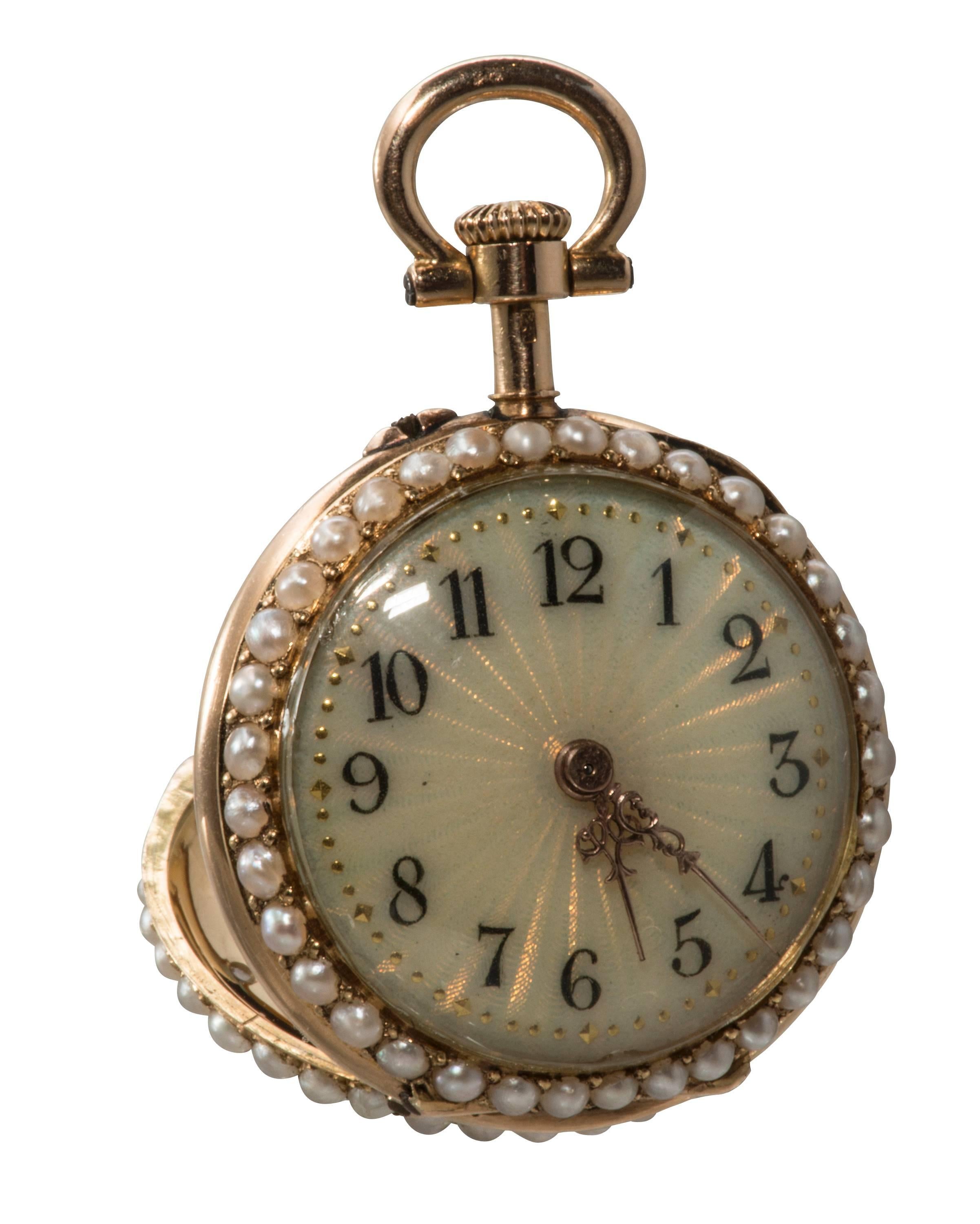 This is an exquisite Russian pendant watch made of enamel and natural pearls.