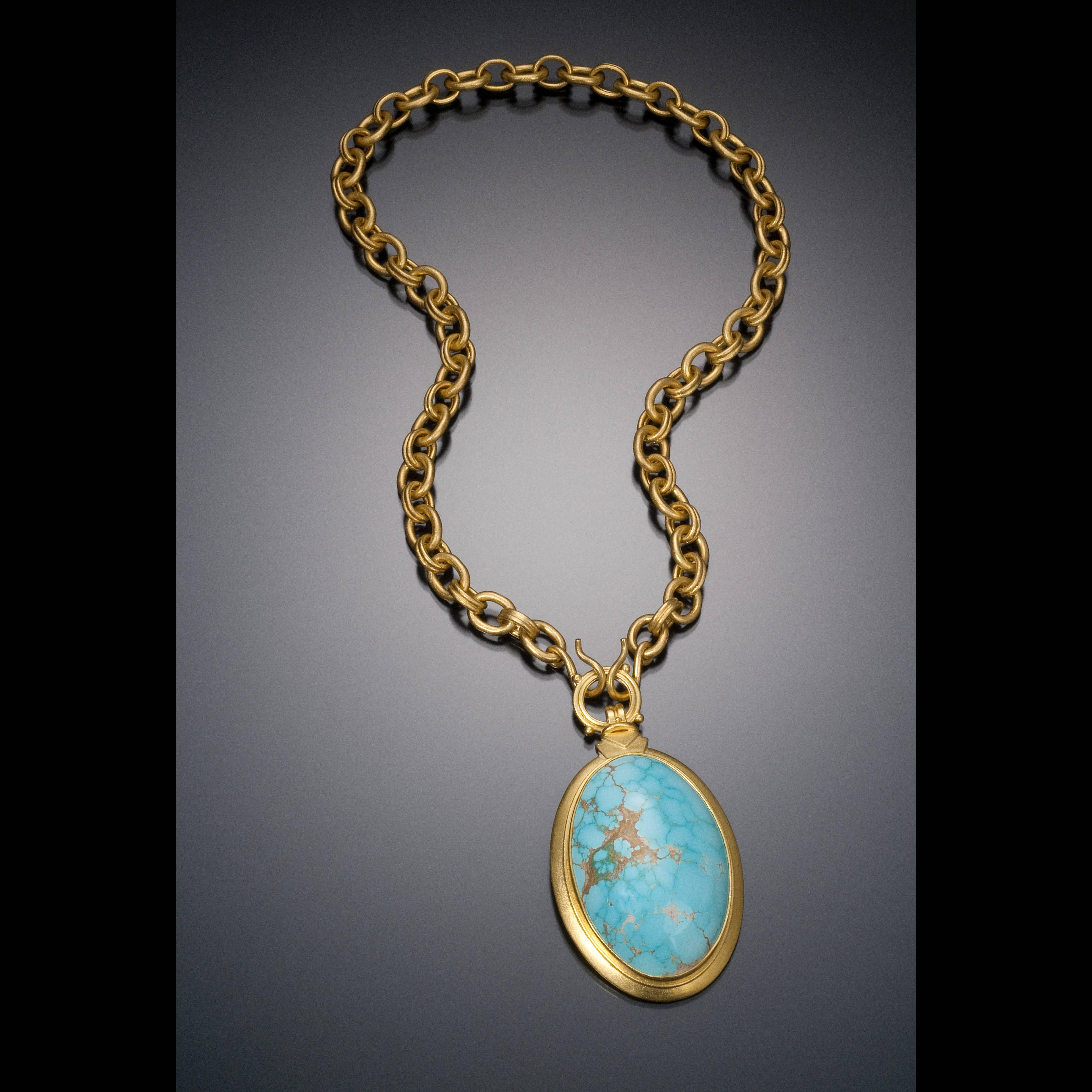 Large natural Turquoise from the Southwest United States, set in 22kt Gold, with handmade 22kt chain. Natural (untreated, not dyed) Turquoise of this size and quality is extremely rare. 

* Each piece is designed and crafted entirely by hand in