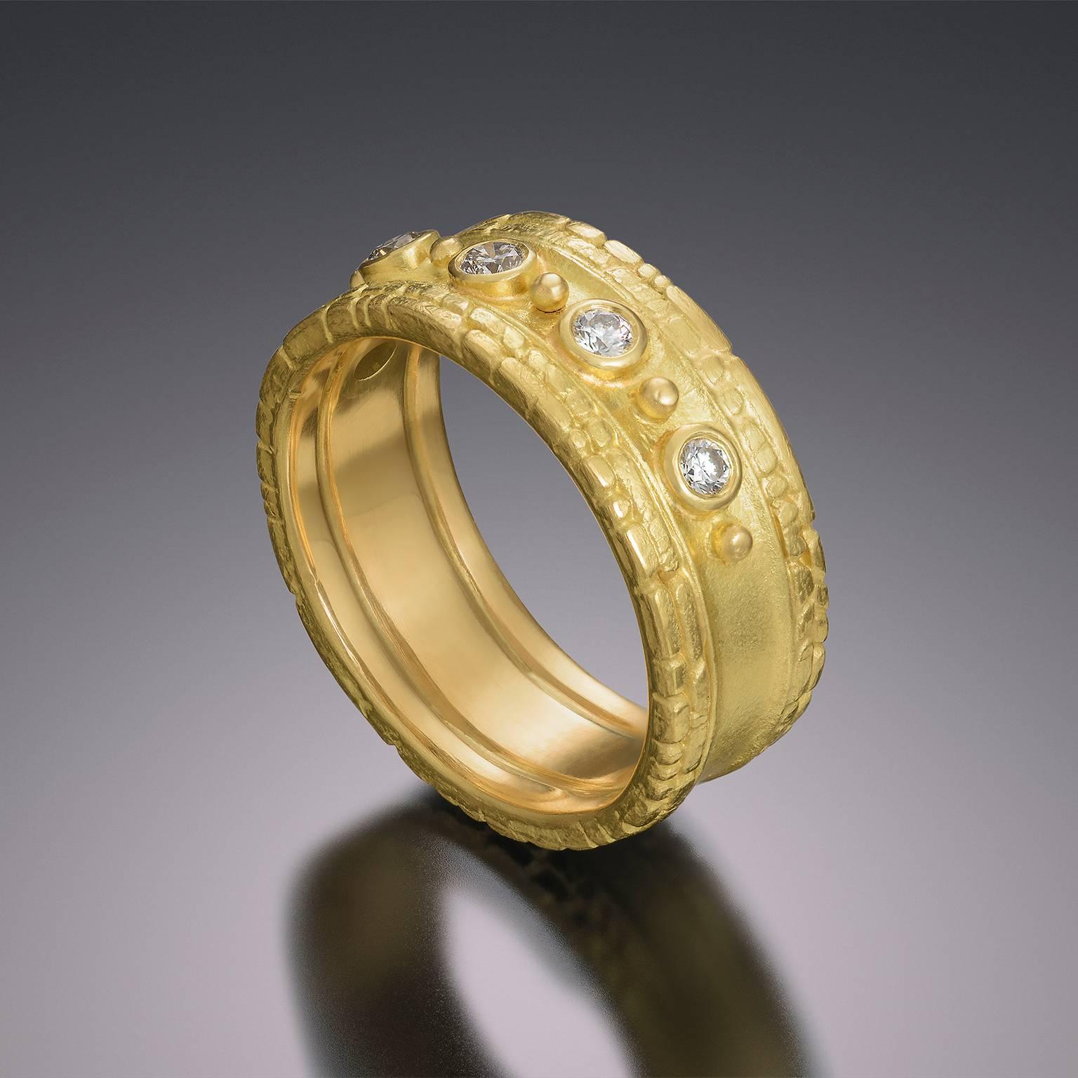 18tk Gold Band with Five Round Diamonds and Granulation.

* Each piece is designed and crafted entirely by hand in the traditional way, using age old techniques and processes.

* Rings can be sized