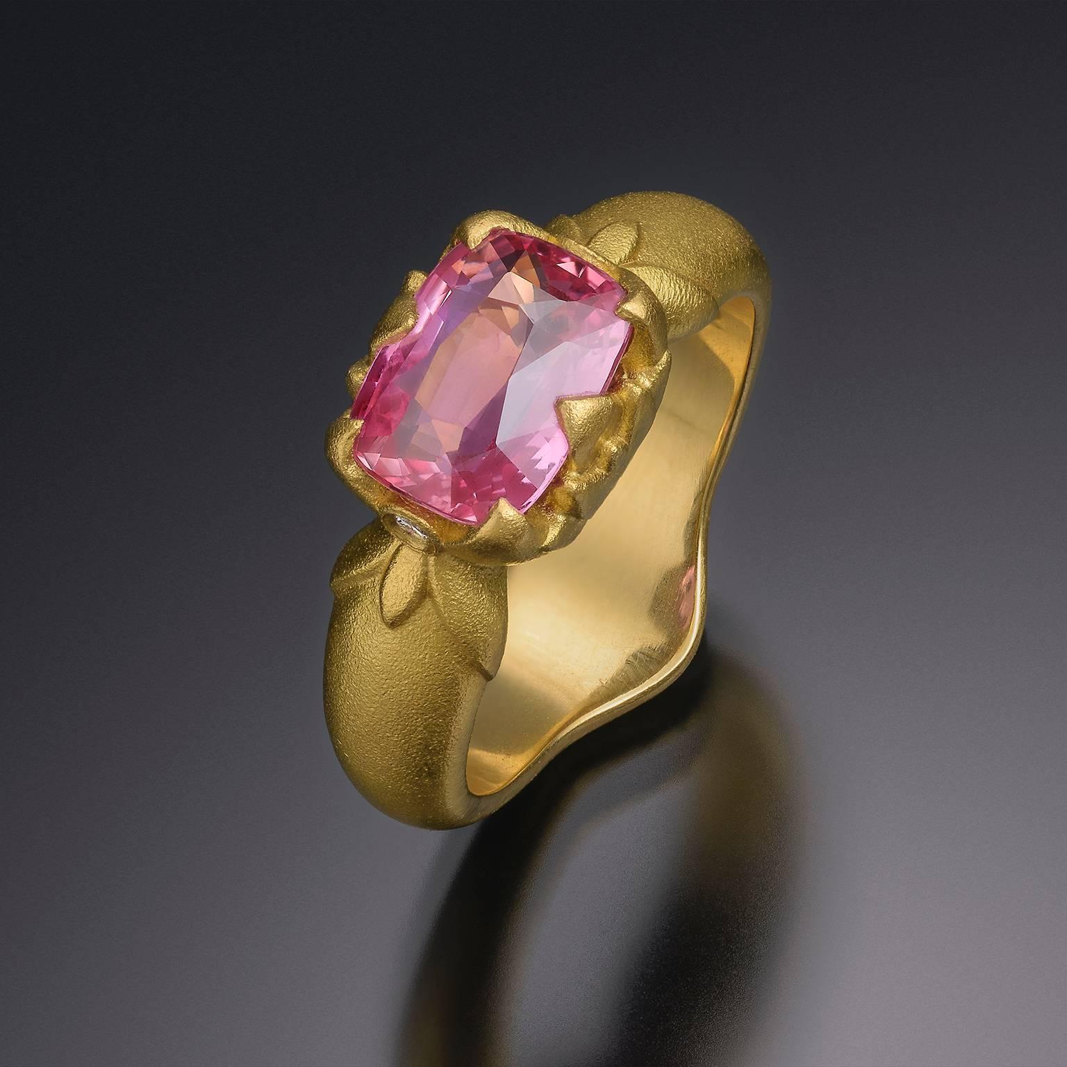 Handmade 22kt gold Ring with Pink Padparasha Sapphire and two 2mm F Color White Diamonds. 

Ring Size: 6.5

* Each piece is designed and crafted entirely by hand in the traditional way, using age old techniques and processes.

GIA cert., 2.52