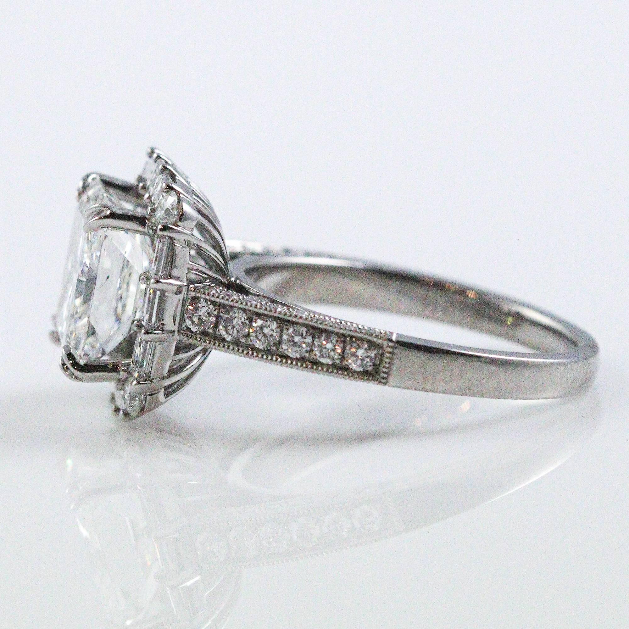 Women's 3.09 Carat Radiant Cut Diamond Halo Style Ring in 18 Karat White Gold