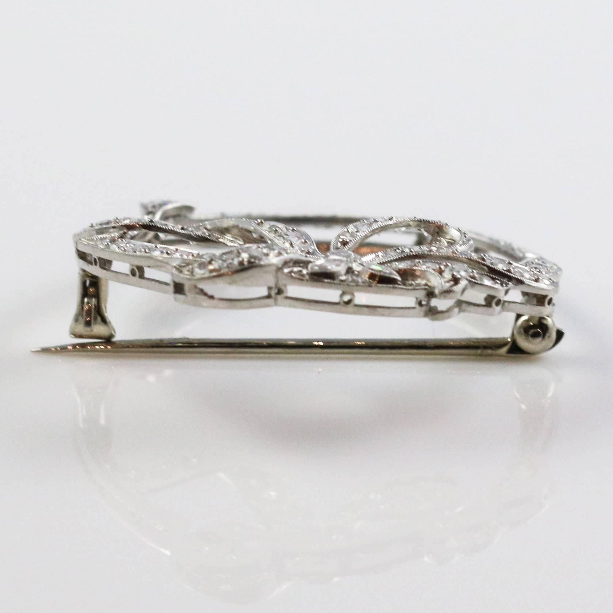 Art Deco Platinum and Diamond Bow Motif Brooch In Excellent Condition In Birmingham, AL