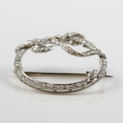 Art Deco Platinum and Diamond Bow Motif Brooch