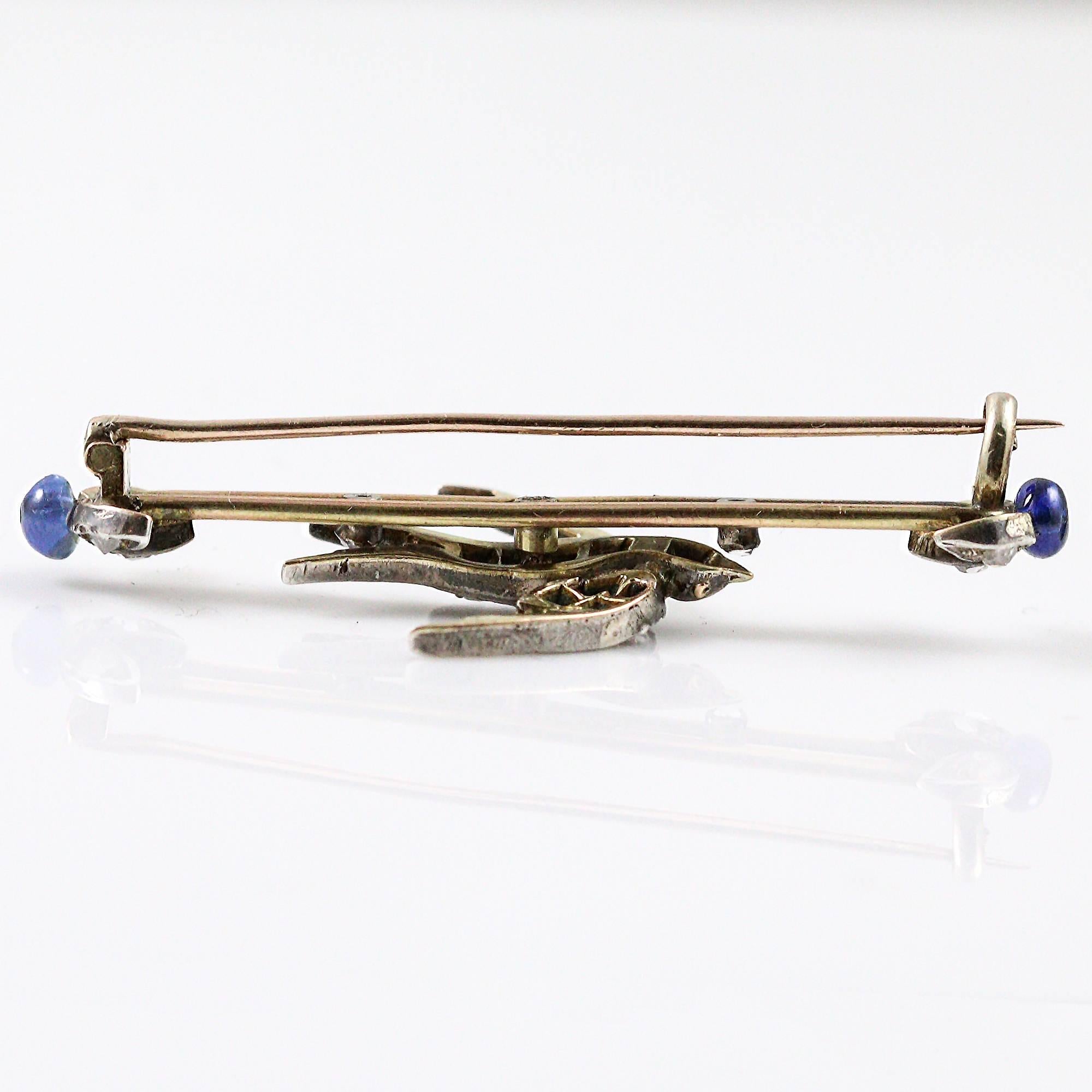 Victorian Sterling Silver and 10k Gold Swallow Brooch with Diamonds and Sapphire In Excellent Condition In Birmingham, AL