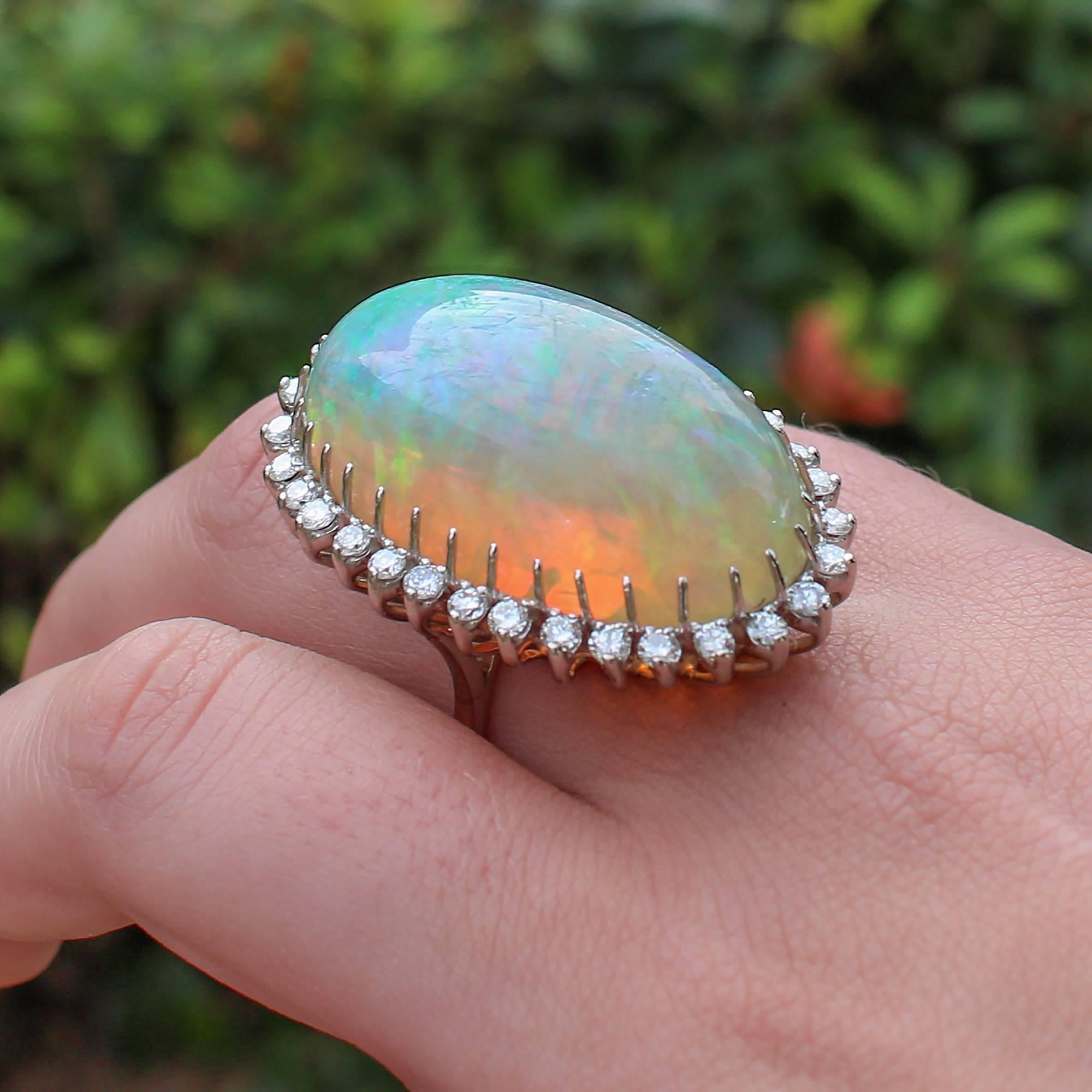 1960s-70s Modernist 47.05 Carat Cabochon Opal Ring with Diamond Halo 2