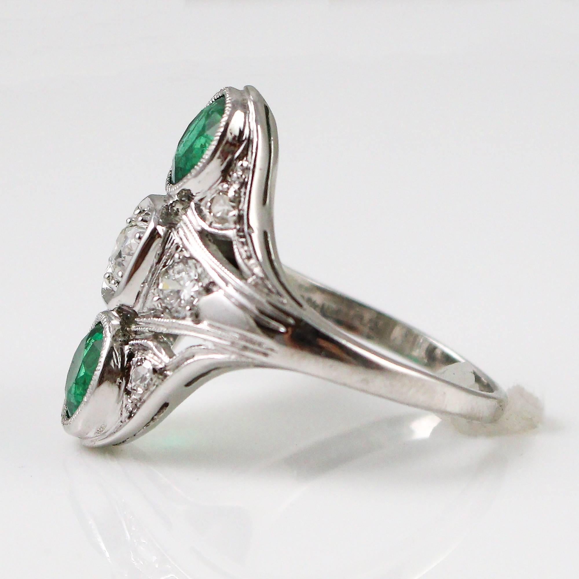 This gorgeous ring centers a 0.39ct old European cut diamond grading as an 