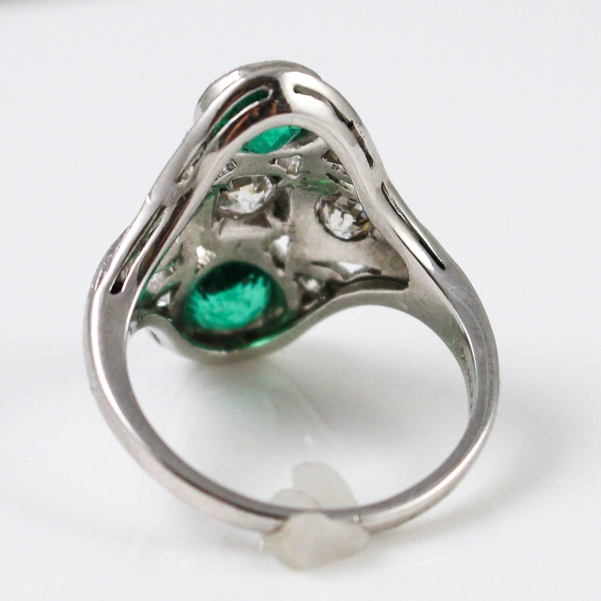 1920s Art Deco  Diamond Emerald Elongated Platinum Dinner Ring In Excellent Condition In Birmingham, AL