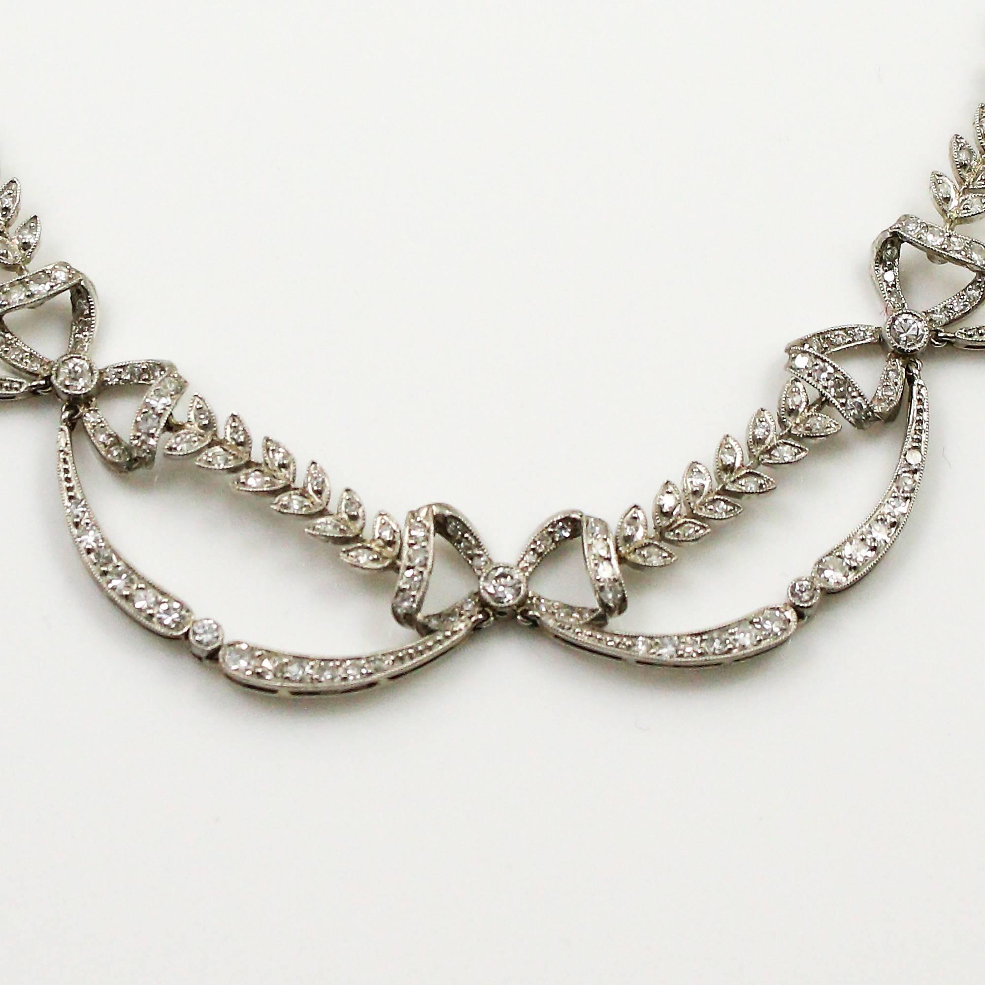 Edwardian Platinum And Diamond Bow and Leaf Motif Necklace In Excellent Condition In Birmingham, AL