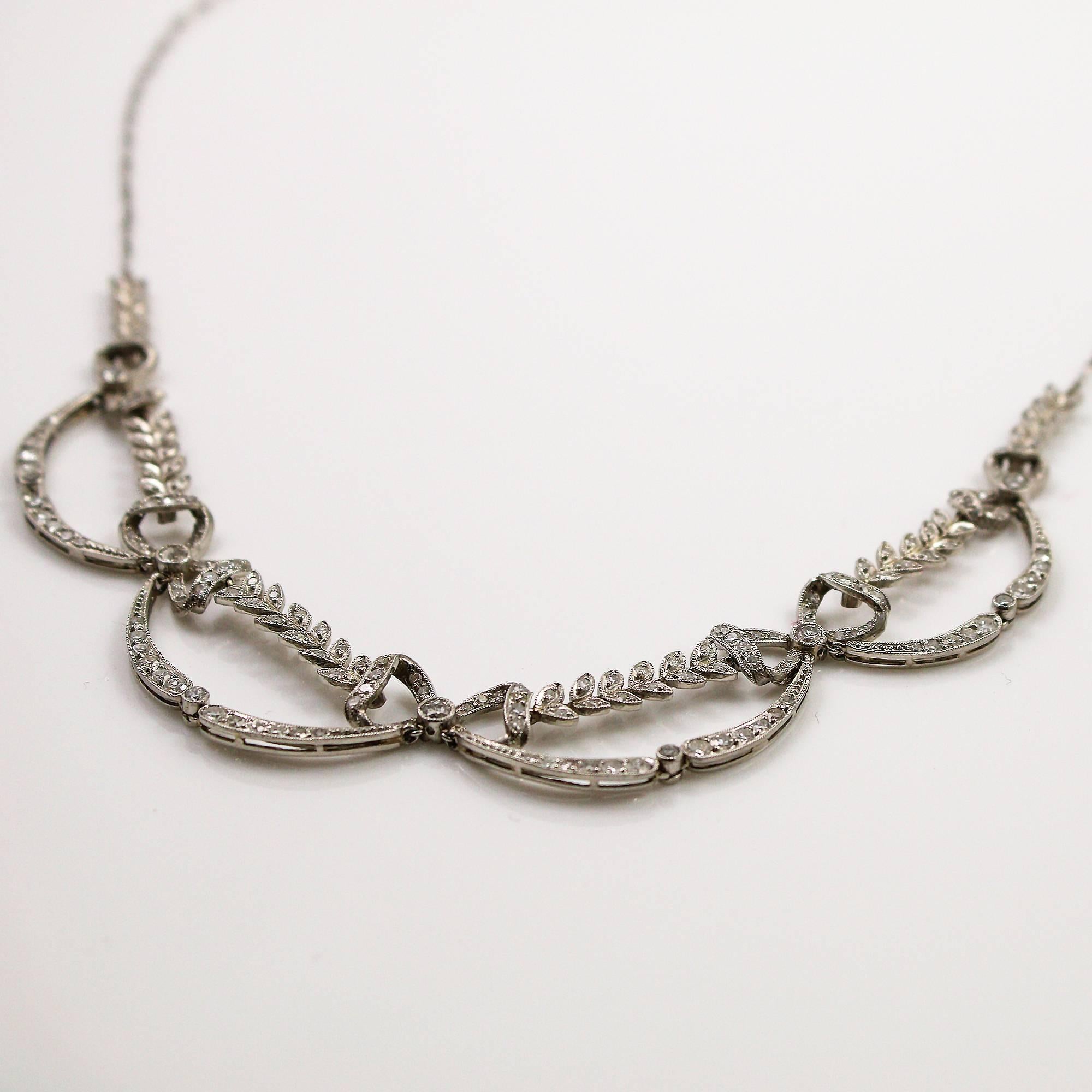 Women's or Men's Edwardian Platinum And Diamond Bow and Leaf Motif Necklace