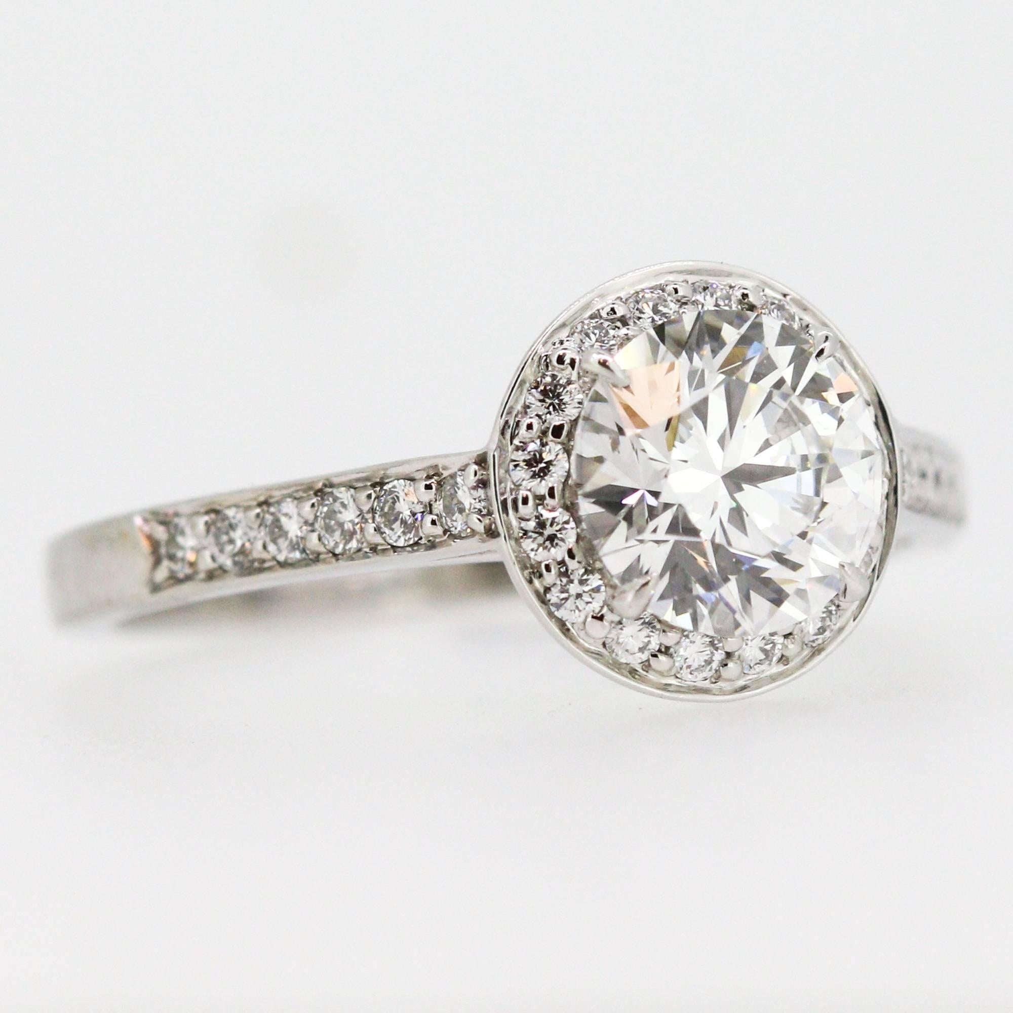 Women's Tiffany & Co 1.25 carat Round Diamond Halo Style Ring