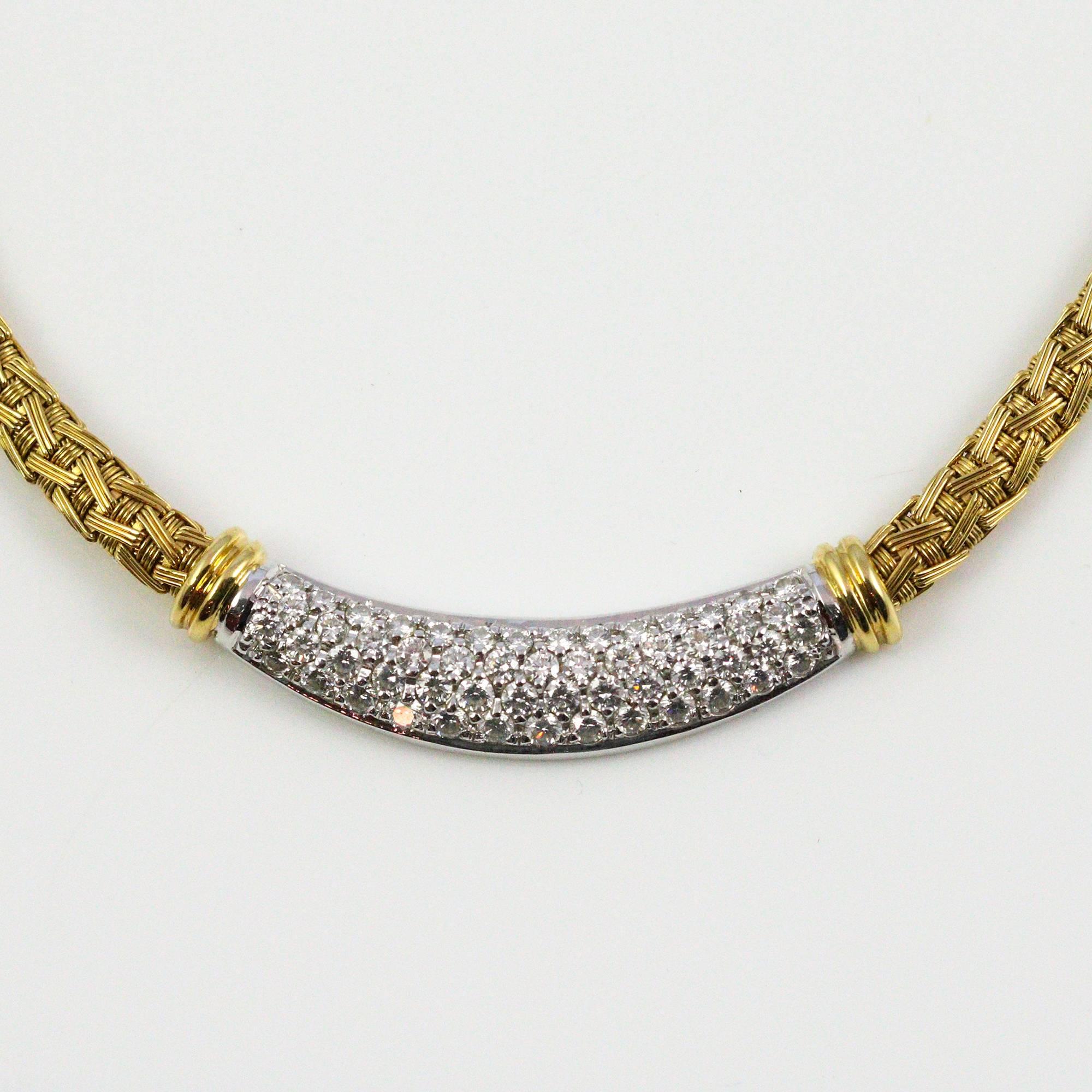 This beautiful necklace features an 18k yellow gold woven silk design with a 4 row pave diamond base. The 55 round diamonds are set in white gold, weigh a total of 2.98ctw and grade as "F-G" in color and "VS1-2" in clarity.