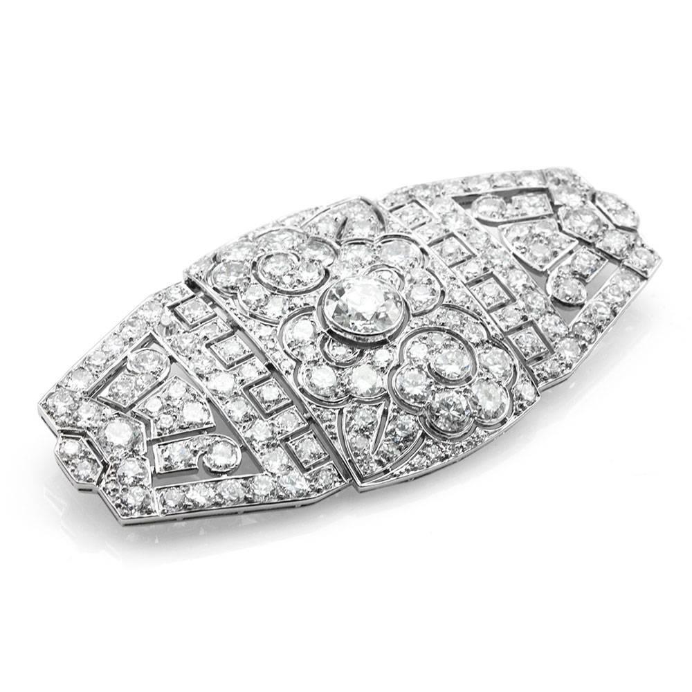Art Deco diamond brooch / pin in high polished platinum. There is one bezel set, European cut diamond (1.33ct) with a color of J and a clarity of VS2. There are one hundred seventy european cut diamonds (15.83ctw) with a color of H- I and a clarity