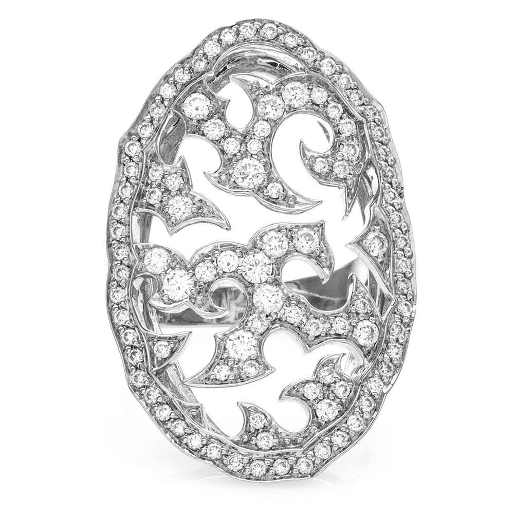 Stephen Webster Thorn collection pavé diamond oval ring in high polished 18K white gold. There are ninety-seven round brilliant cut diamonds (1.25ctw) with a color of F-G and a clarity of VS-SI. The diamonds are bead set. The overall size of this