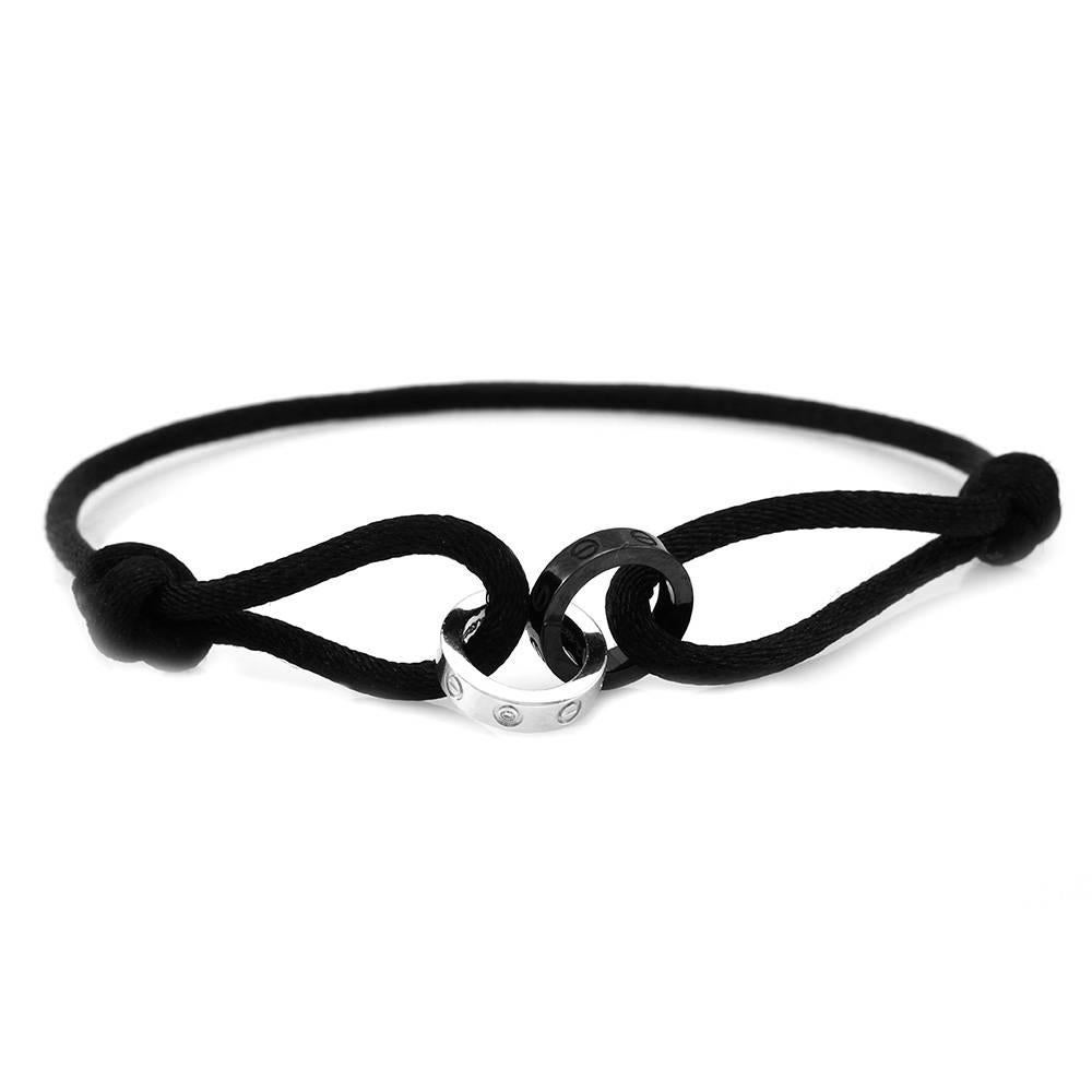 Cartier Bracelet en cordon noir de la collection Love avec détails en or blanc 18 carats et céramique
