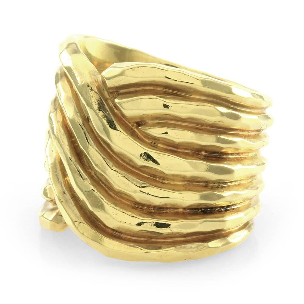 Henry Dunay texture crossover ring in high polished 18K yellow gold.  The overall size of this ring is (Head/ Embellishment) 17.8mm, (Band Width) Graduated 17.8mm-11.3mm, (Band Thickness) Shank- 1.5mm. The total weight of this ring is 17.0g/