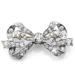 Antique Edwardian Platinum and Gold Diamond Bow Pin