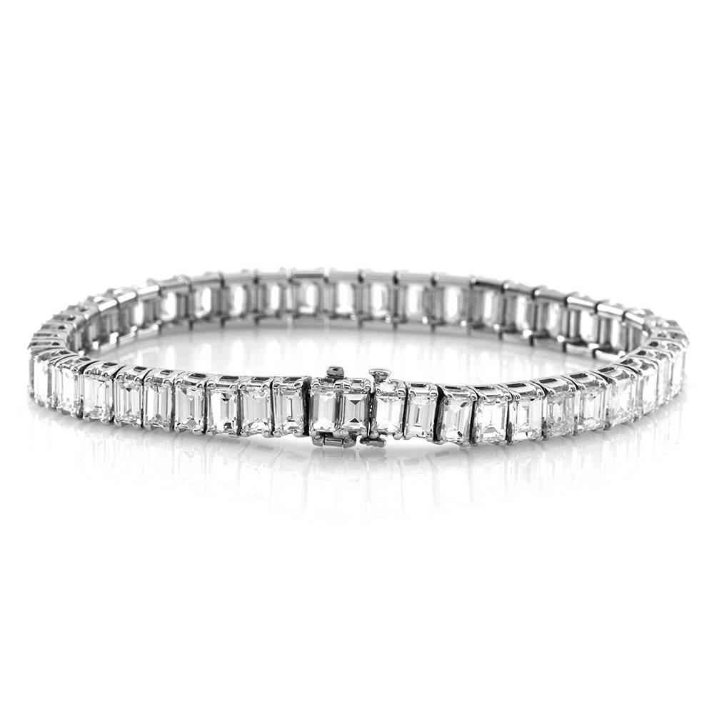 Baguette cut diamond tennis bracelet set in platinum. There are forty-seven graduated baguette cut diamonds (17.80ctw) with a color of G-I and a clarity of VS. The diamonds are prong set in high polish platinum. This bracelet has a double push