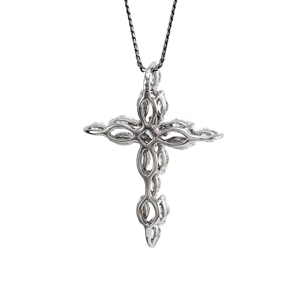 Trice mixed cut diamond cross pendant in high polished 18K white gold. There are sixteen marquise cut and one princess cut diamonds total (1.39ctw) with a color of H-I and a clarity of VS2-SI2. The diamonds are prong set. The pendant measures 28.9mm