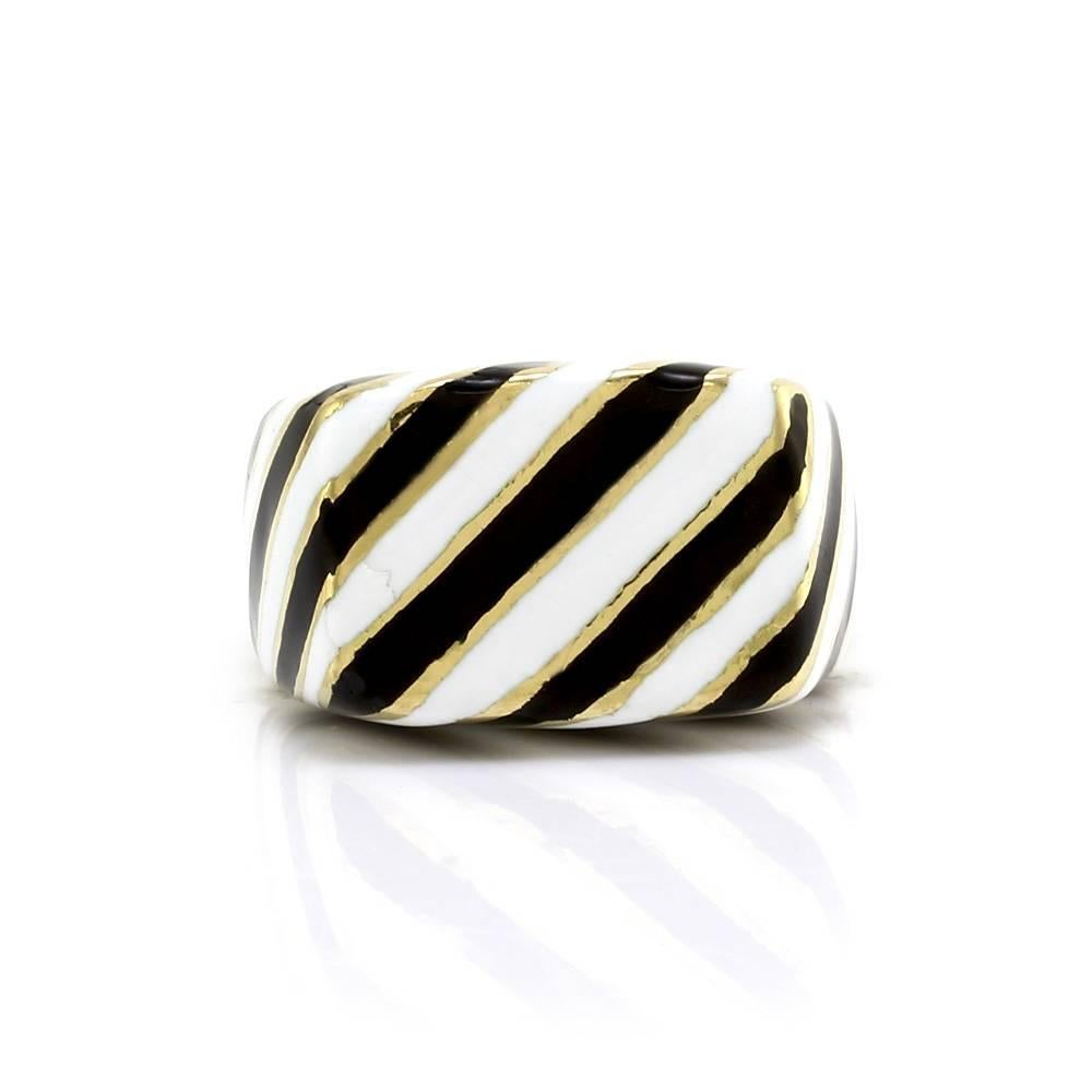 David Webb Kingdom collection zebra striped black and white enamel ring set in 18K yellow gold. The overall size of this ring is (Head/ Embellishment) 14.2mm x 19.6mm, (Band Width) Graduated - 4.8mm-9.5mm, (Band Thickness) 3.3mm. The total weight of