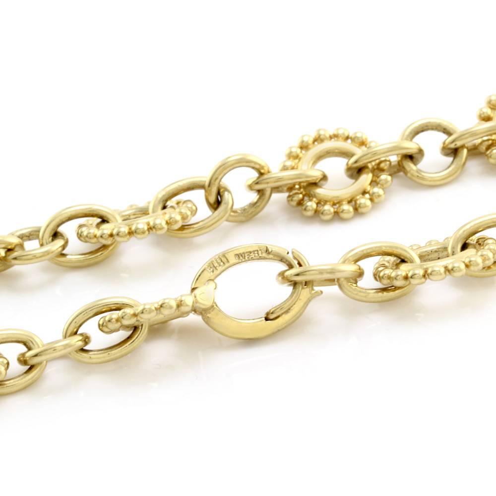 David Webb beaded link chain necklace set in 18K yellow gold. The fancy link chain measures 6.6mm-13.3mm wide and 34 inches long. This necklace is finished with a snap closure ring and has a total weight of 134.6g/ 86.6dwt.

Size: