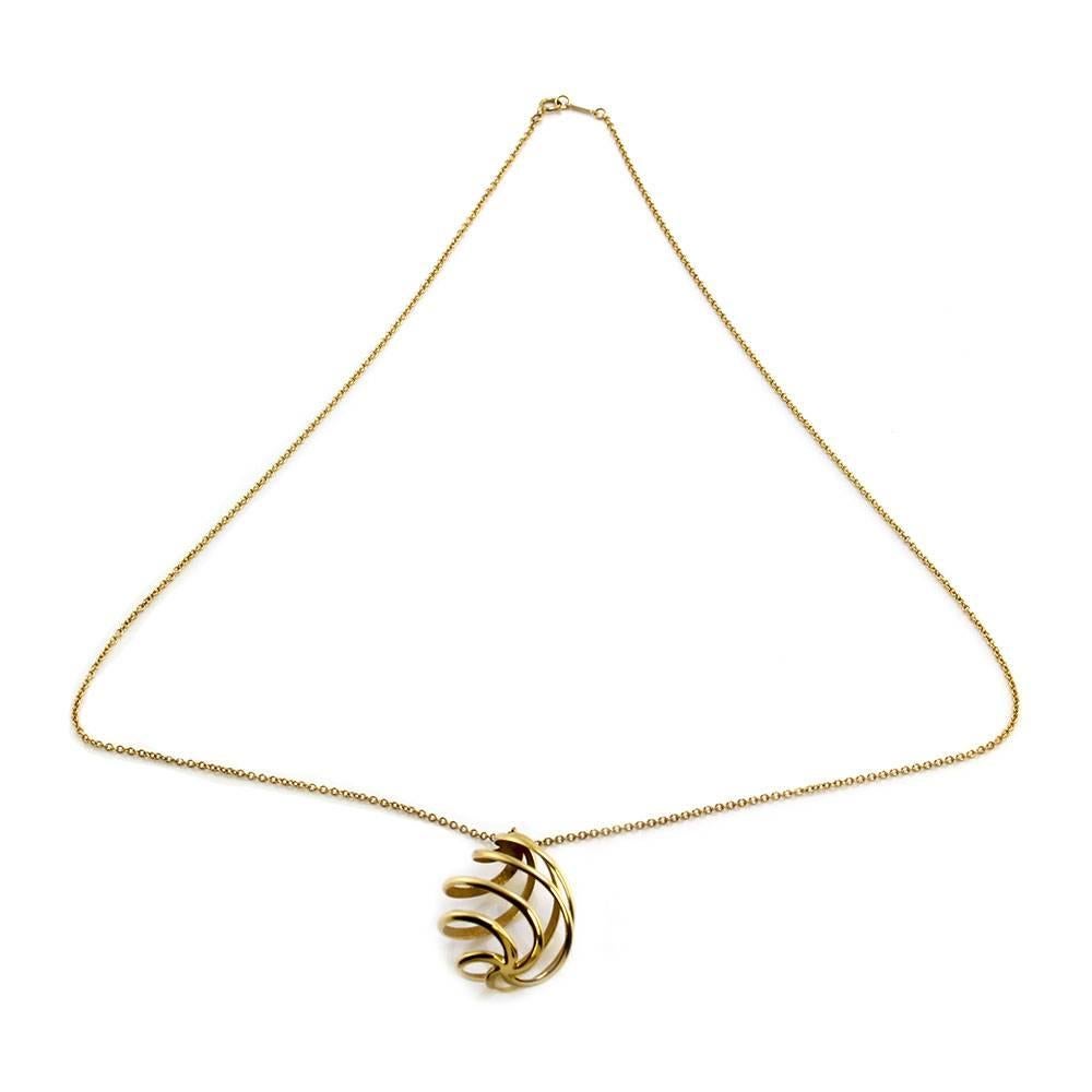 Tiffany & Co. Paloma Picasso Venezia Luce spiral necklace in 18K yellow gold. The pendant measures 41.7mm x 25.0mm, which comes on a 1.5mm rolo link chain with spring ring clasp. This necklace is 24 inches, with a total weight of 13.4g/ 8.6dwt. This