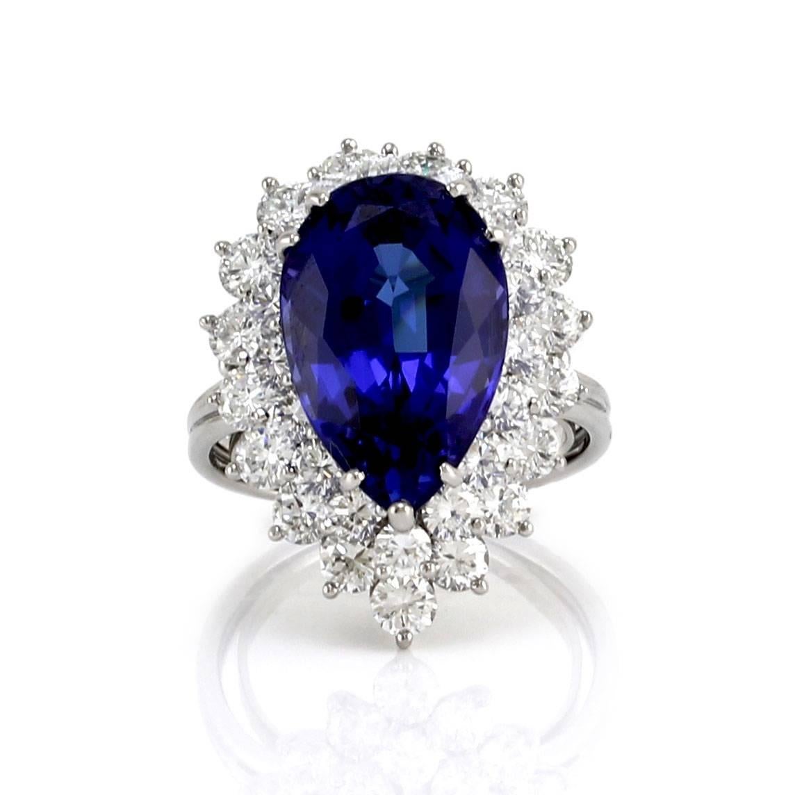 Tiffany & Co. pear tanzanite and diamond double halo ring in 900 platinum. There is one mixed cut tanzanite (7.75ct) with a brilliant cut crown and step cut pavilion. There are thirty-three round brilliant cut diamonds (2.84ctw) with a color of F-G