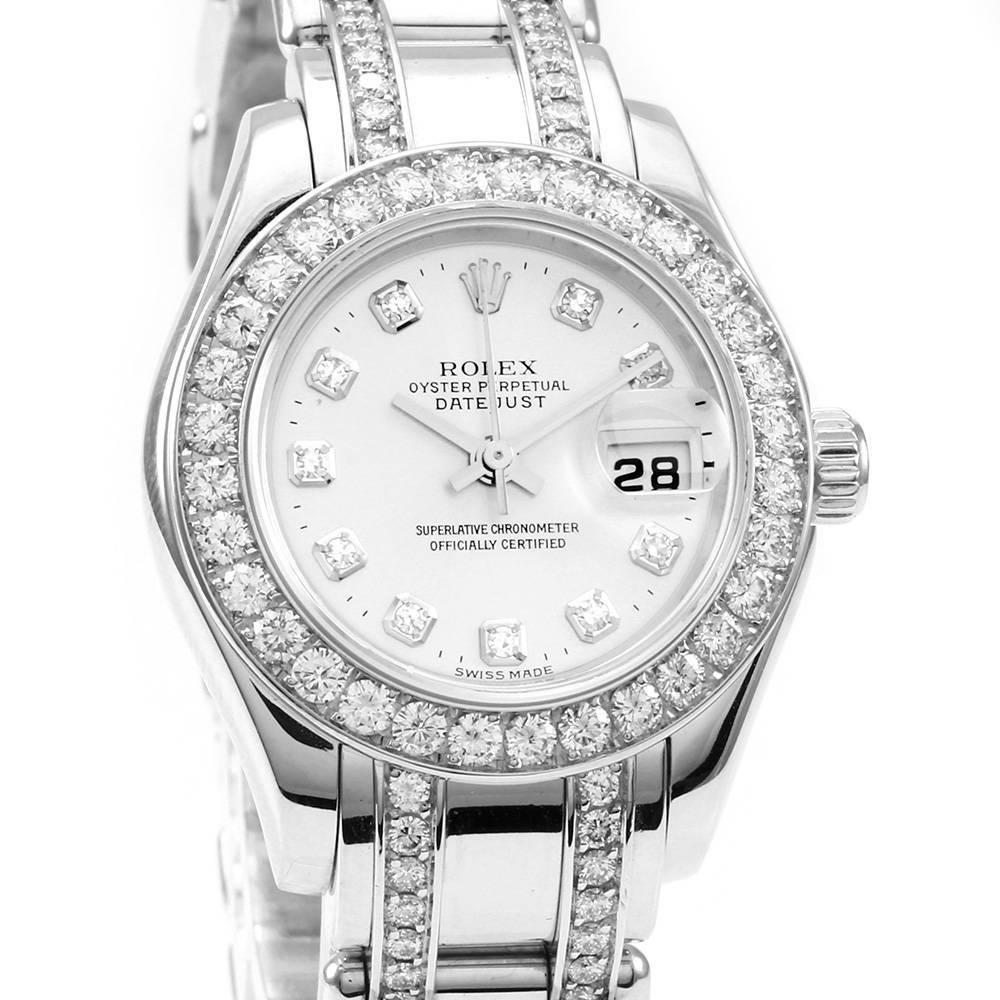 Ladies 18k white gold diamond bezel Rolex Pearlmaster wristwatch, reference number 80299. The watch has 18k white gold case, fixed 18k white gold and diamond bezel, mother of pearl dial with 10 round diamond markers. It has Swiss automatic movement