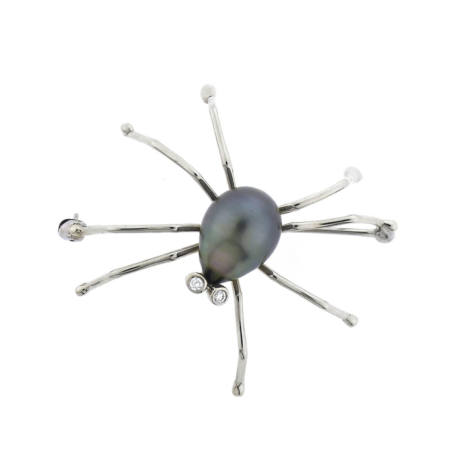 Original T. Foster &  Co. design features a pear shaped Black Tahitian pearl as the "Body" of the spider with bezel set diamond "eyes".  Whimsical and fun, this 18 karat white gold pin measures 1 and 5/8 inches across and