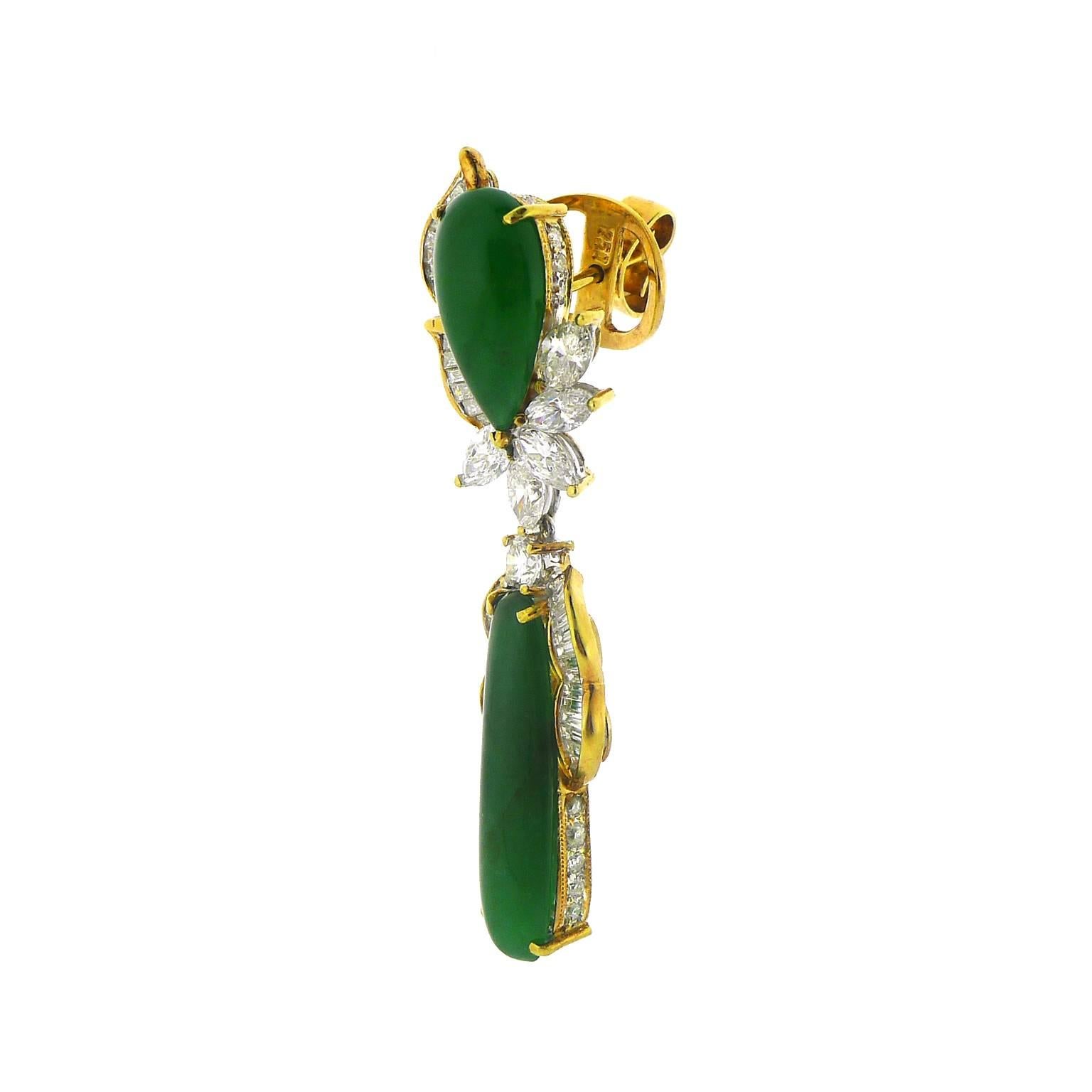 All four jadeites have a GIA certificate stating that the stones are jadeite jade, translucent, natural color with no indications of impregnation. The stones weigh 14.05 grams all together. There are ten marquise shaped diamonds totaling