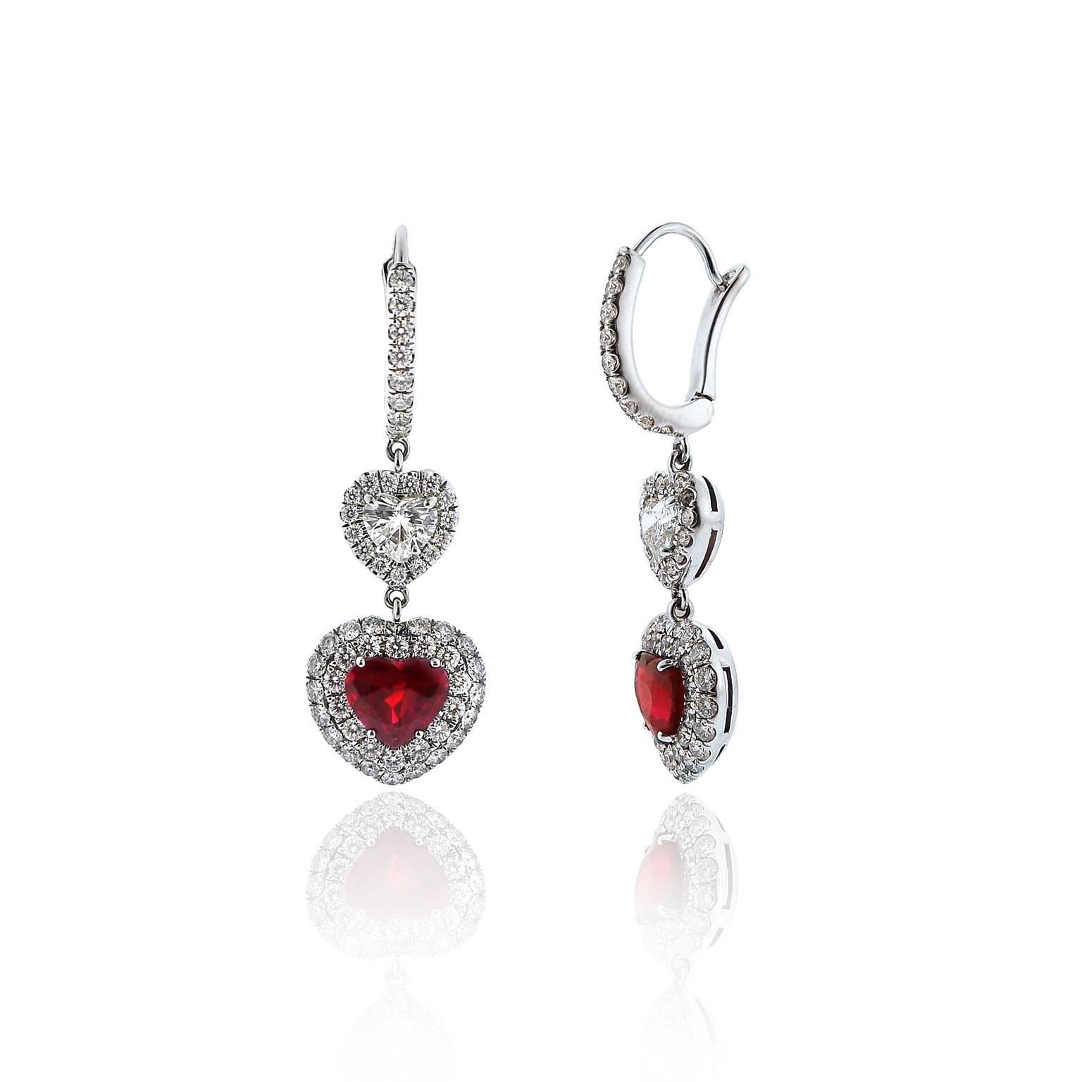 A perfectly matched pair of heart-shaped Burmese rubies weigh 3.30 carats for the pair and have GRS certificates stating the rubies are of Burmese origin and 