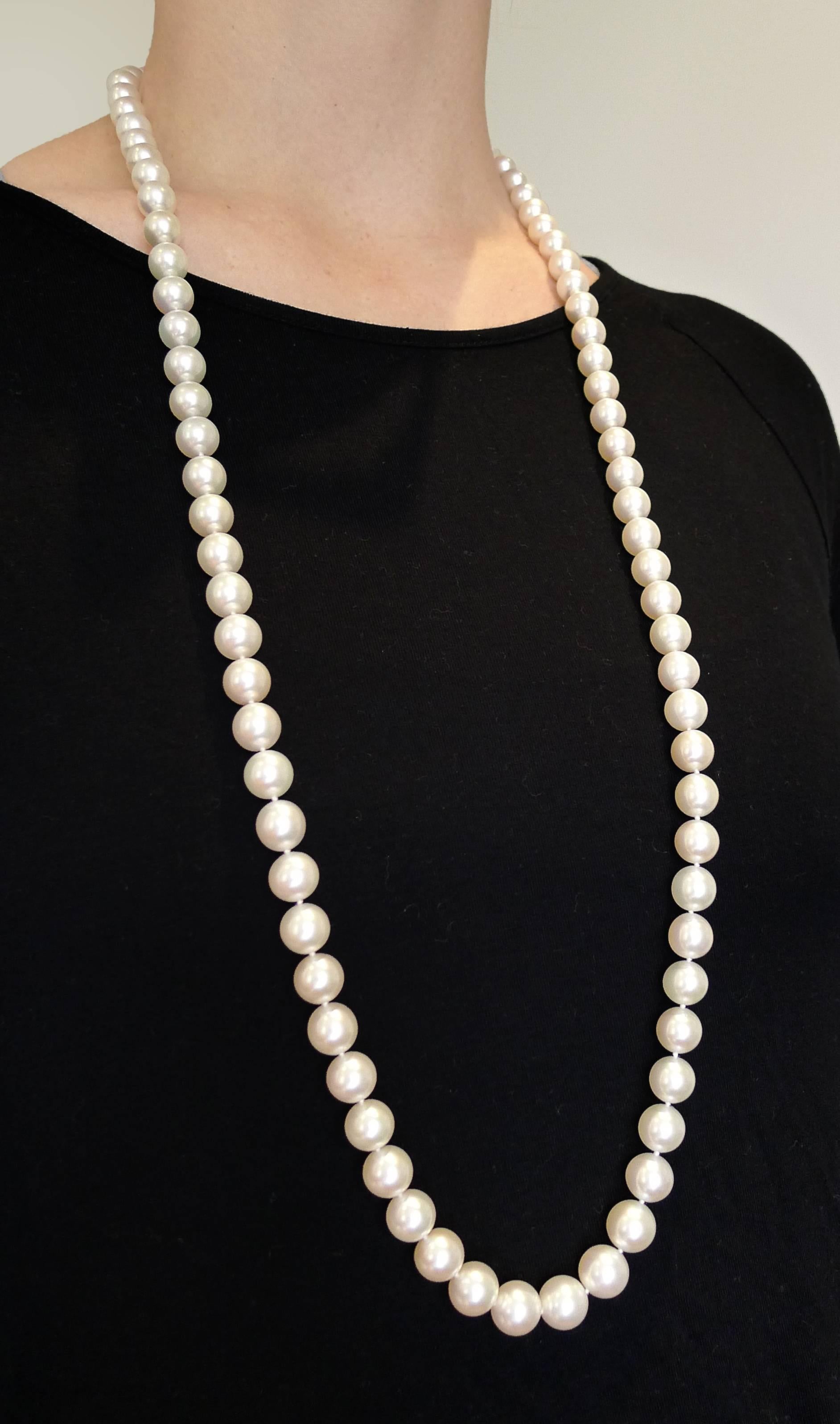 86 white South Sea pearls measure 10.1 to 11.7 millimeters in diameter,  38 inches in length and convert into one 29.5 inch necklace and one 8.5 inch bracelet.  Due to the large size of the pearls, the 8.5 inch bracelet fits like the average 7 inch