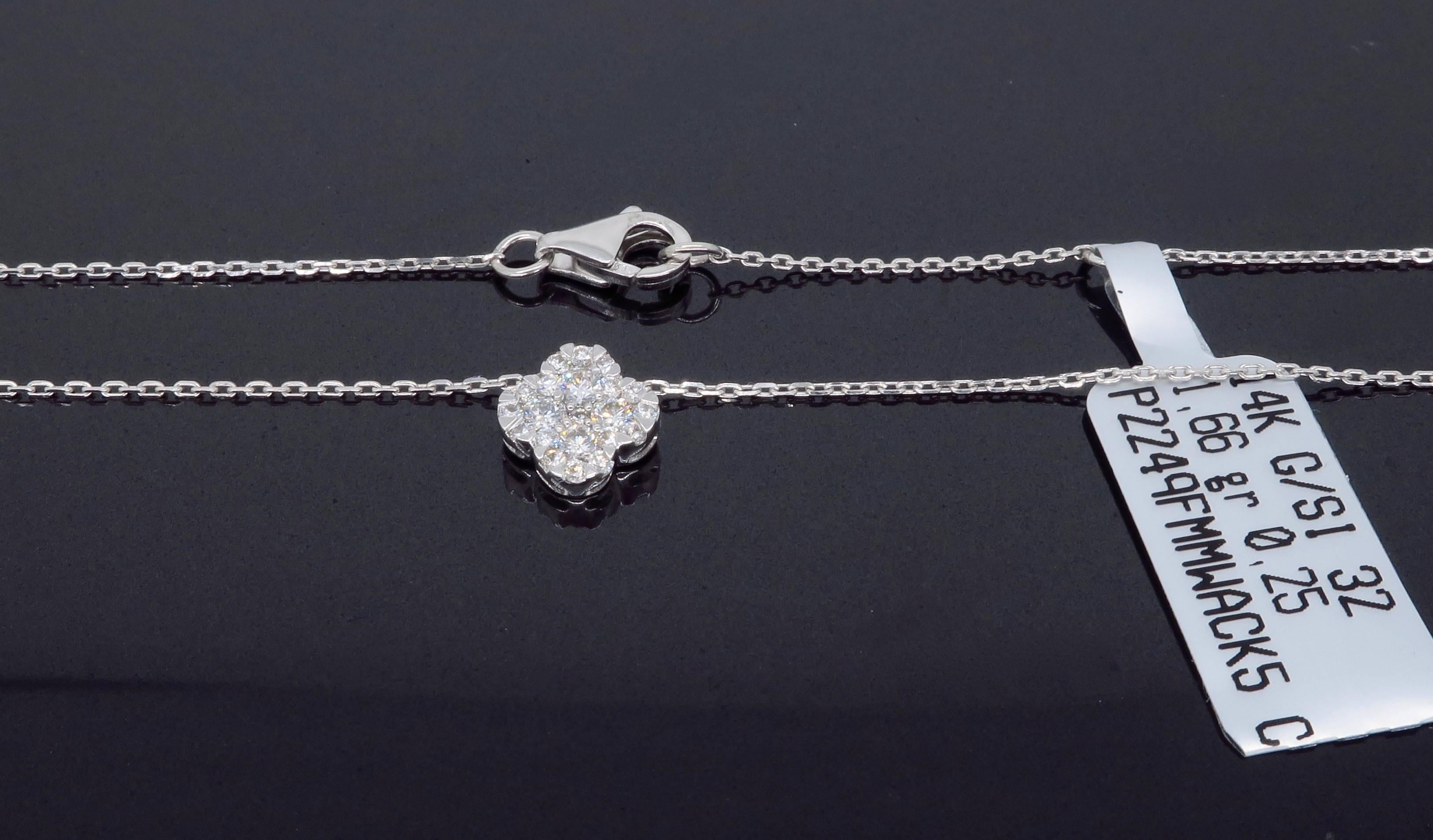14K white gold necklace features .25CTW of Round Brilliant Cut Diamonds set into two rows to form a clover design. The diamonds have G color and SI clarity. Measuring 16.5” in length the necklace weighs 1.66 grams.