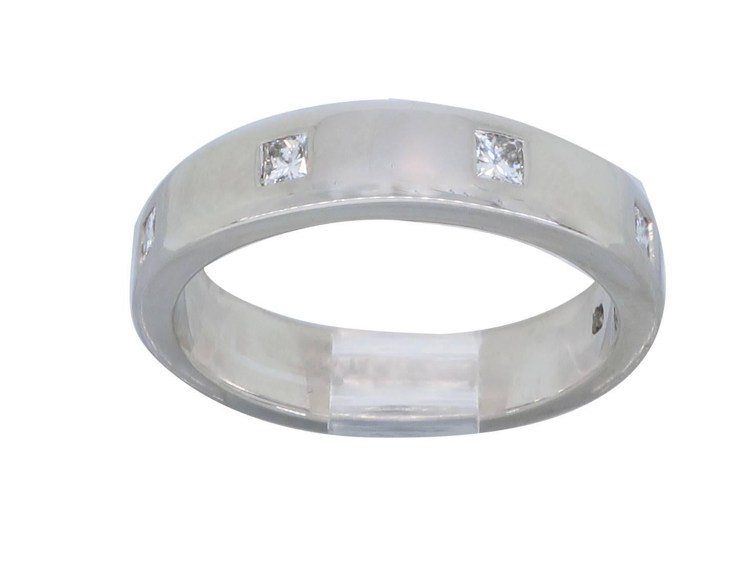 Platinum band features 5 stunning Princess Cut Diamonds. The diamonds display H-I color and VS-SI clarity. There is approximately .30CTW of diamonds in this beautiful band. The band is currently a size 6.25 and weighs 8.4 grams. The band is stamped