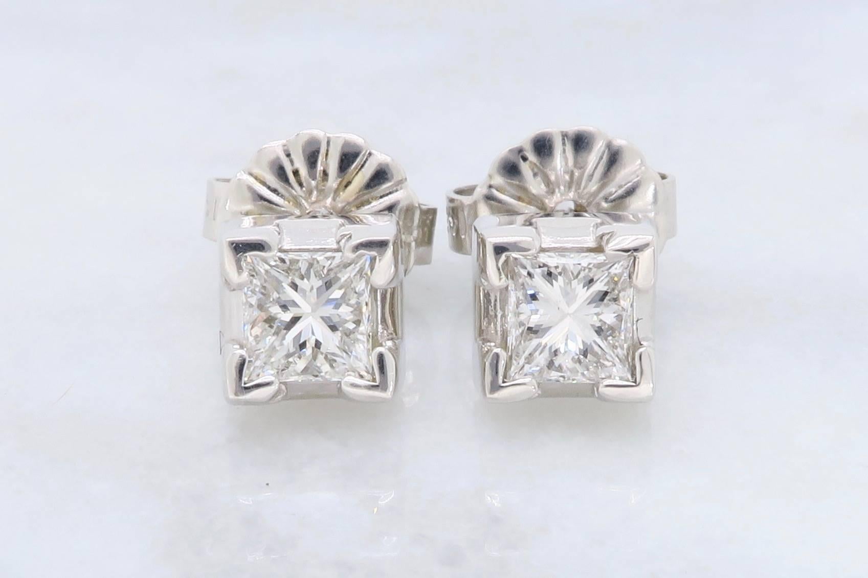 Classic diamond stud earrings with Princess Cut Diamonds. The diamonds have G-H color and SI clarity. The total diamond weight is approximately .50CTW. The 14K white gold earrings weigh 1.3 grams.